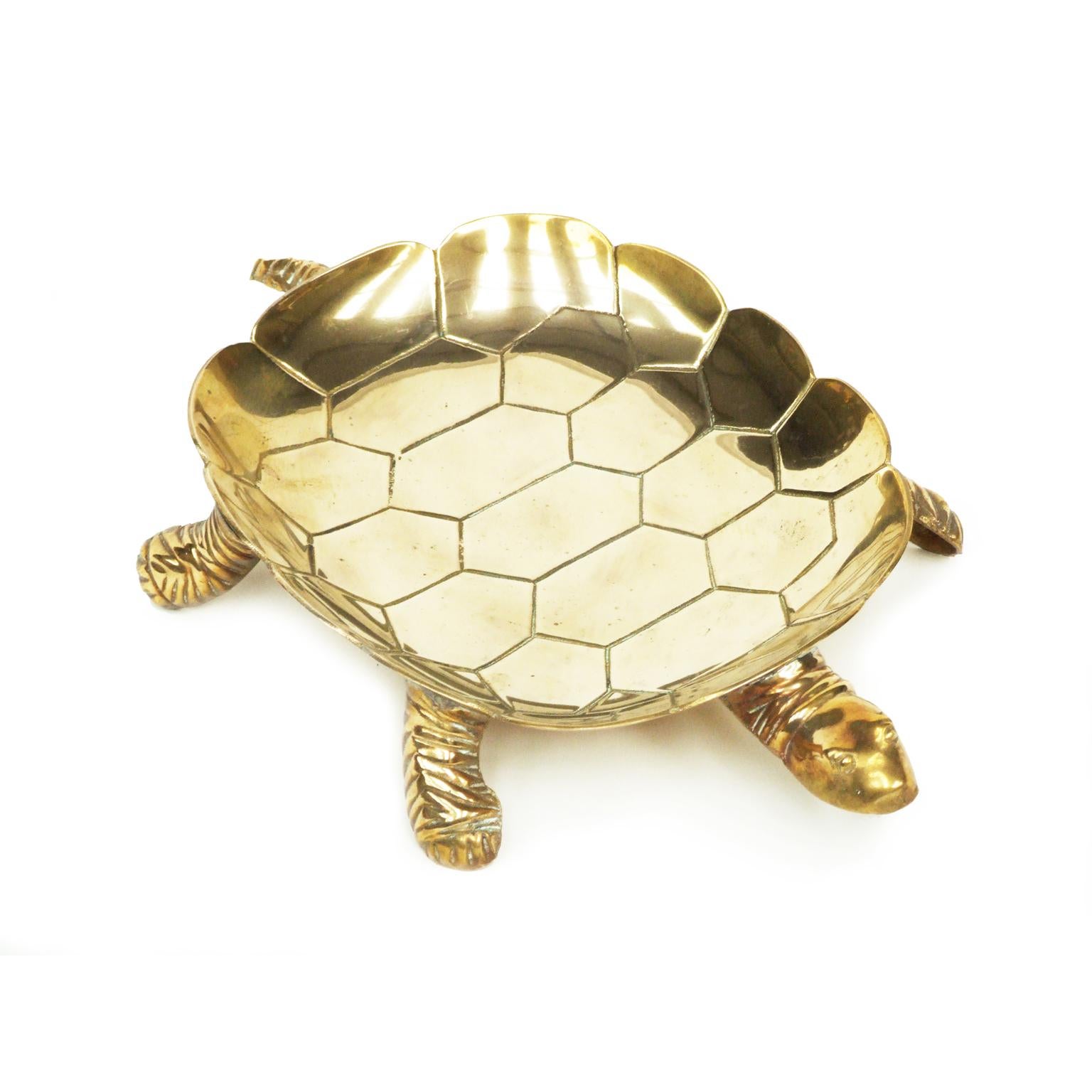 1950s brass turtle dish designed and made in France.

Measures: H 6cm x L 34cm x W 22cm.