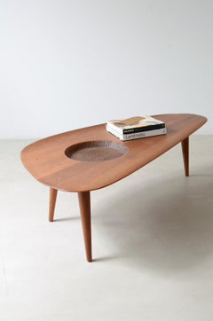1950's large coffee table with an organically shaped solid wood top