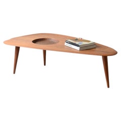 1950's large coffee table with an organically shaped solid wood top