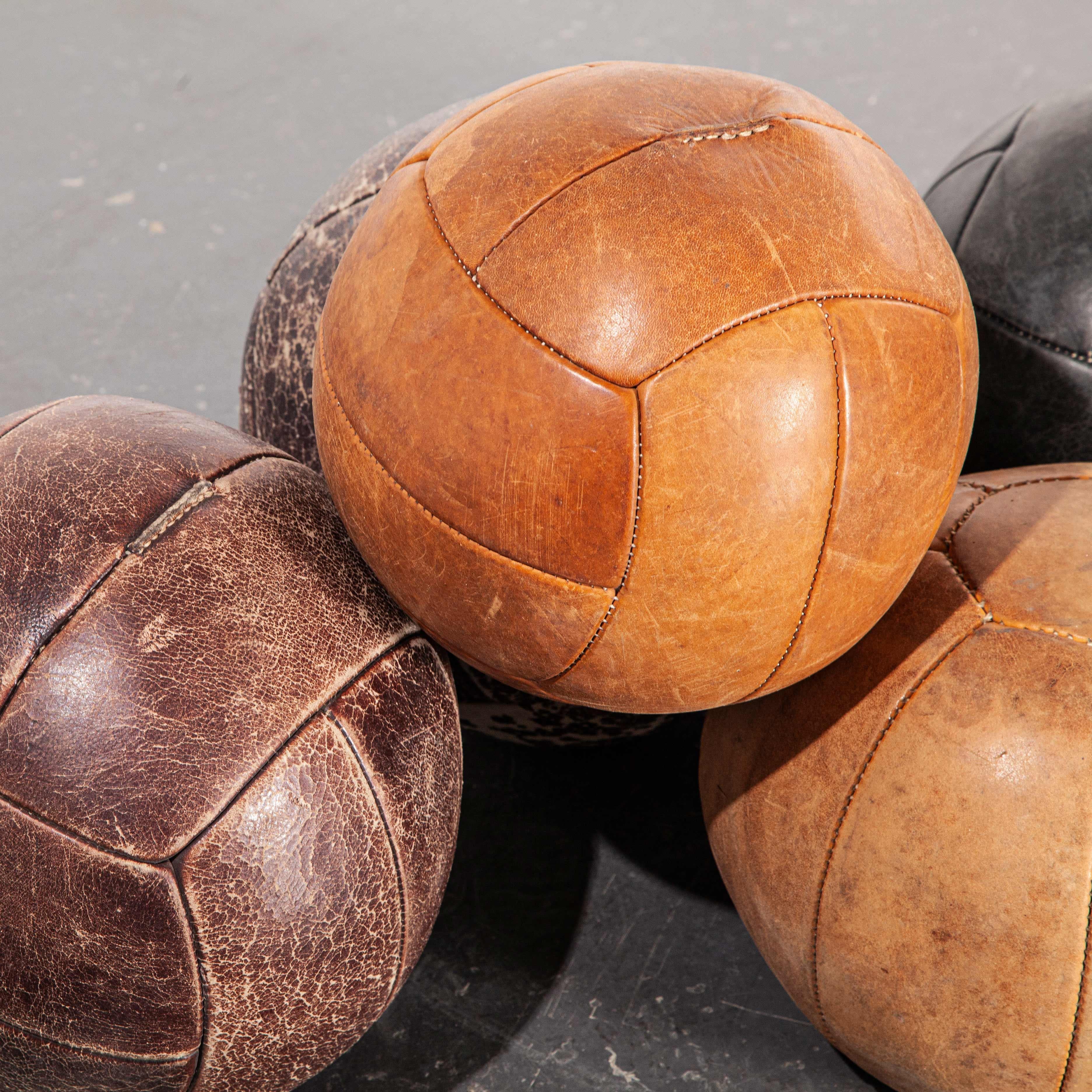 1950s large Czech leather medicine balls – decorative. We have a number of these large handsome worn leather medicine balls that are just full of character.

Workshop report
Our workshop team inspect every product and carry out any needed repairs