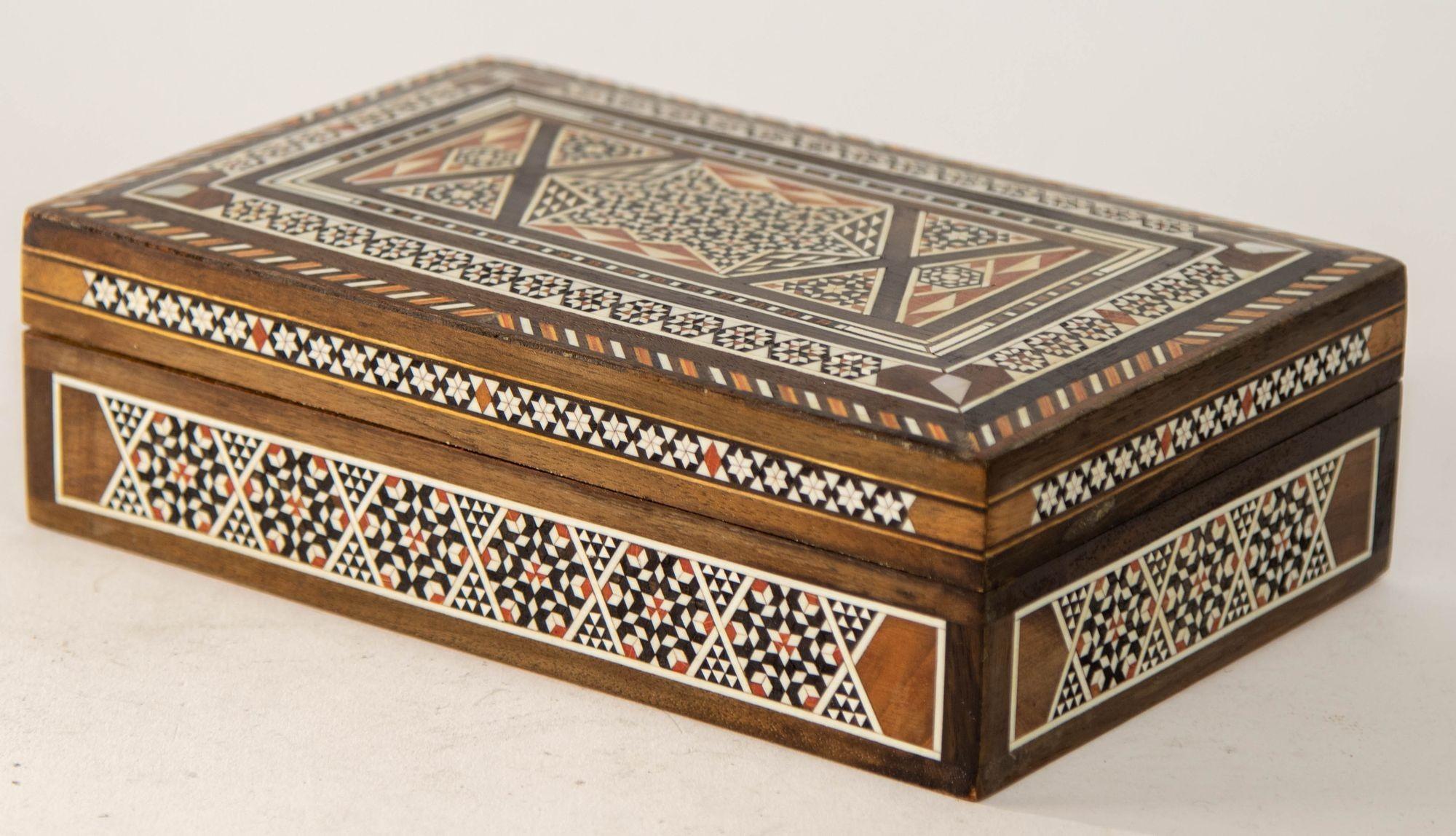 1950s Large Mosaic Mother of Pearl Inlaid Decorative Middle Eastern Islamic Moorish Box.
Vintage 1950s Mosaic Mother of Pearl Inlaid Decorative Middle Eastern Islamic Box.
Mosaic Decorative Middle Eastern Islamic Vanity Box.
Moorish Mosaic Wood Box