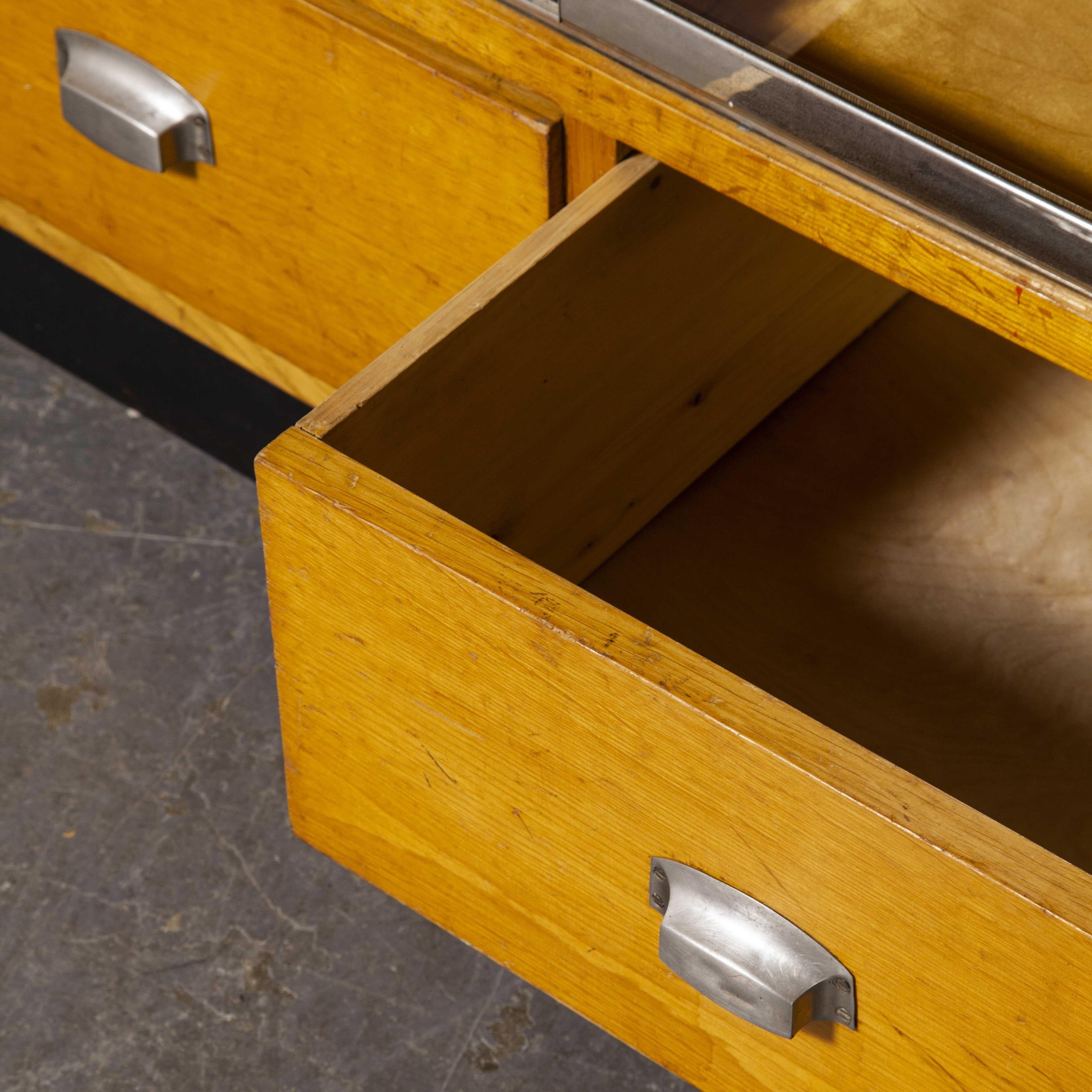 1950s large glass fronted midcentury apothecary cabinet – Storage unit

1950s large glass fronted midcentury apothecary cabinet – Storage unit. Sourced in Germany this was part of a large haul of wonderful shop fit saved from a family owned