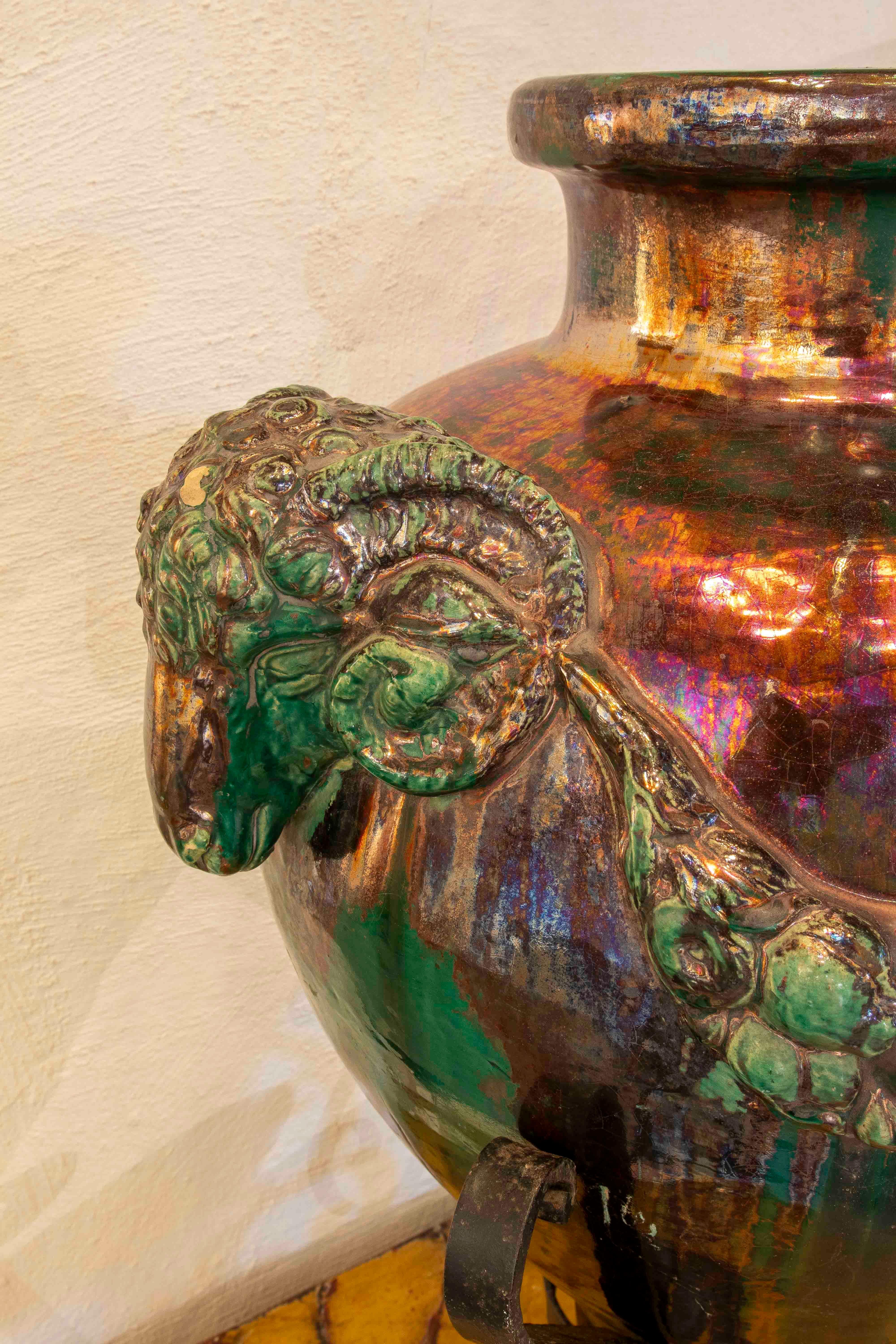 1950s Large Glazed Ceramic Vase with Ram Heads and Wrought Iron Base In Good Condition For Sale In Marbella, ES