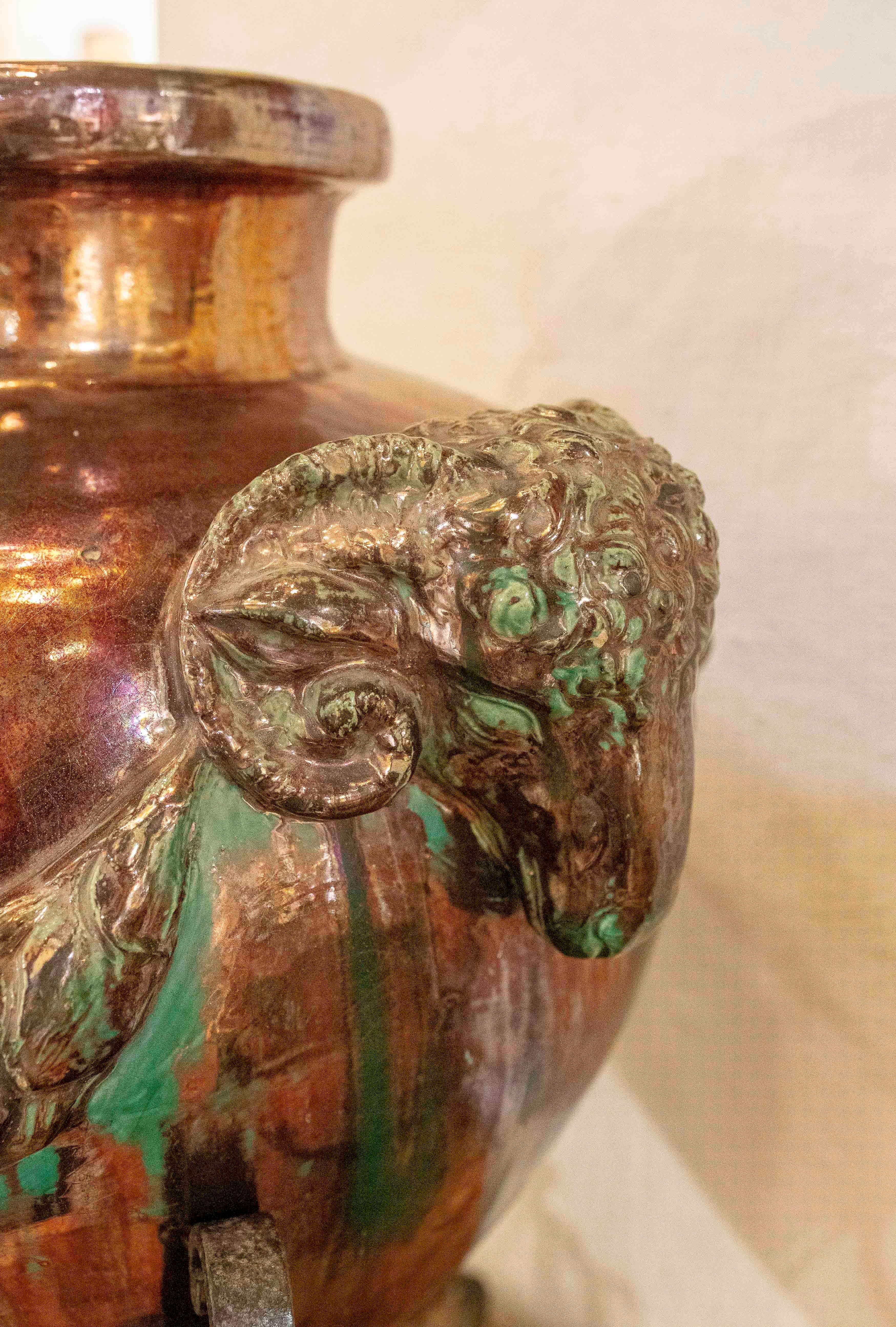 1950s Large Glazed Ceramic Vase with Ram Heads and Wrought Iron Base For Sale 2