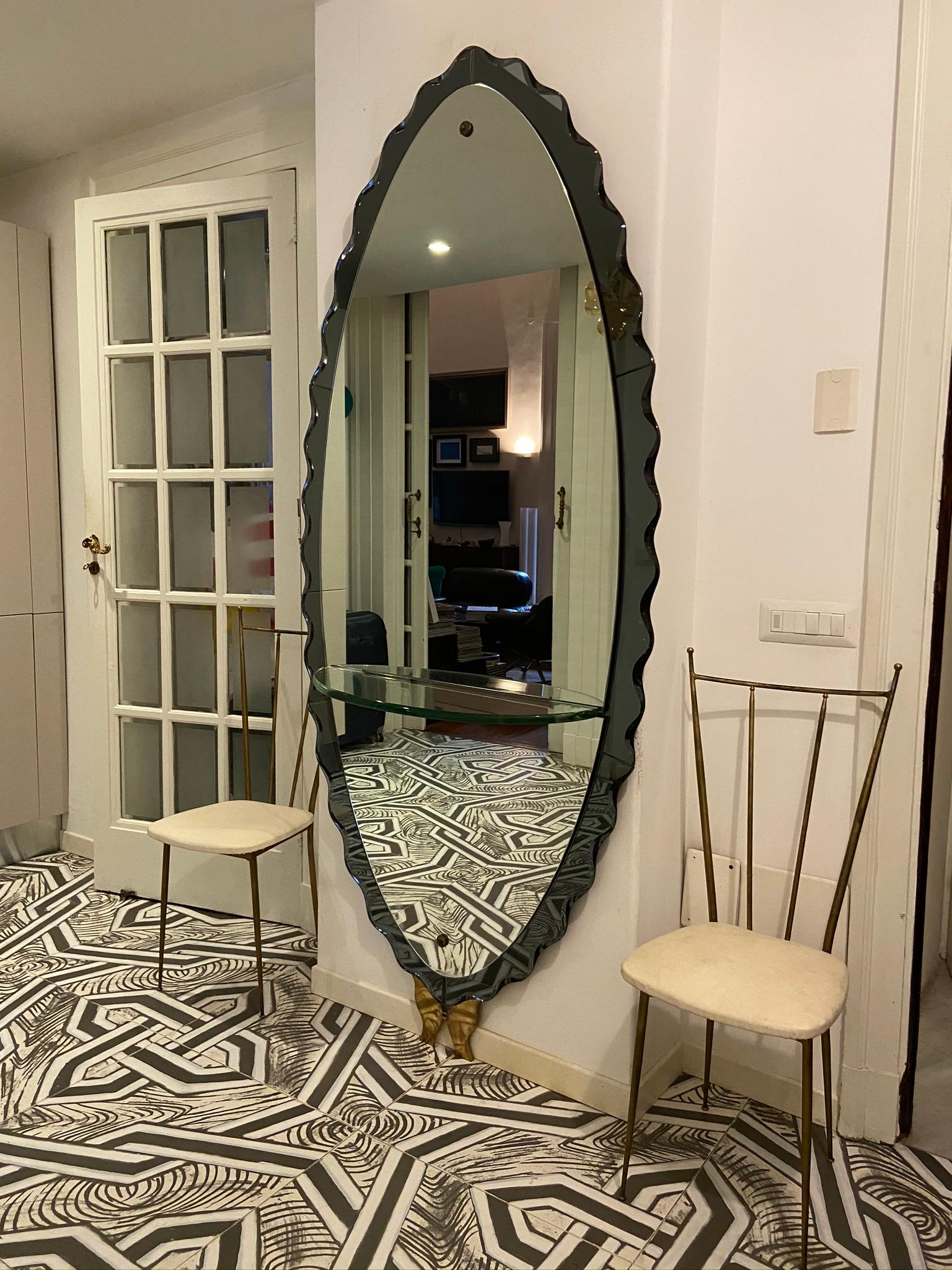 Large wall mirror with shelf, hand-ground frame, brass support, 1950s Cristal Art production.