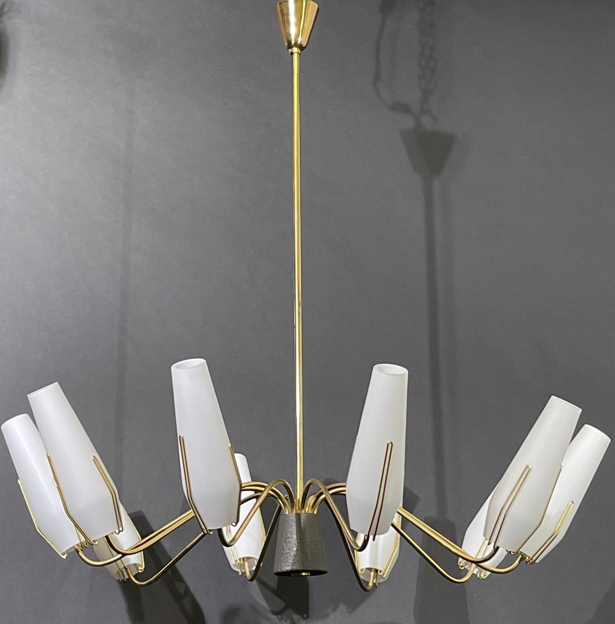 A large ten-light midcentury Italian brass and milk glass 