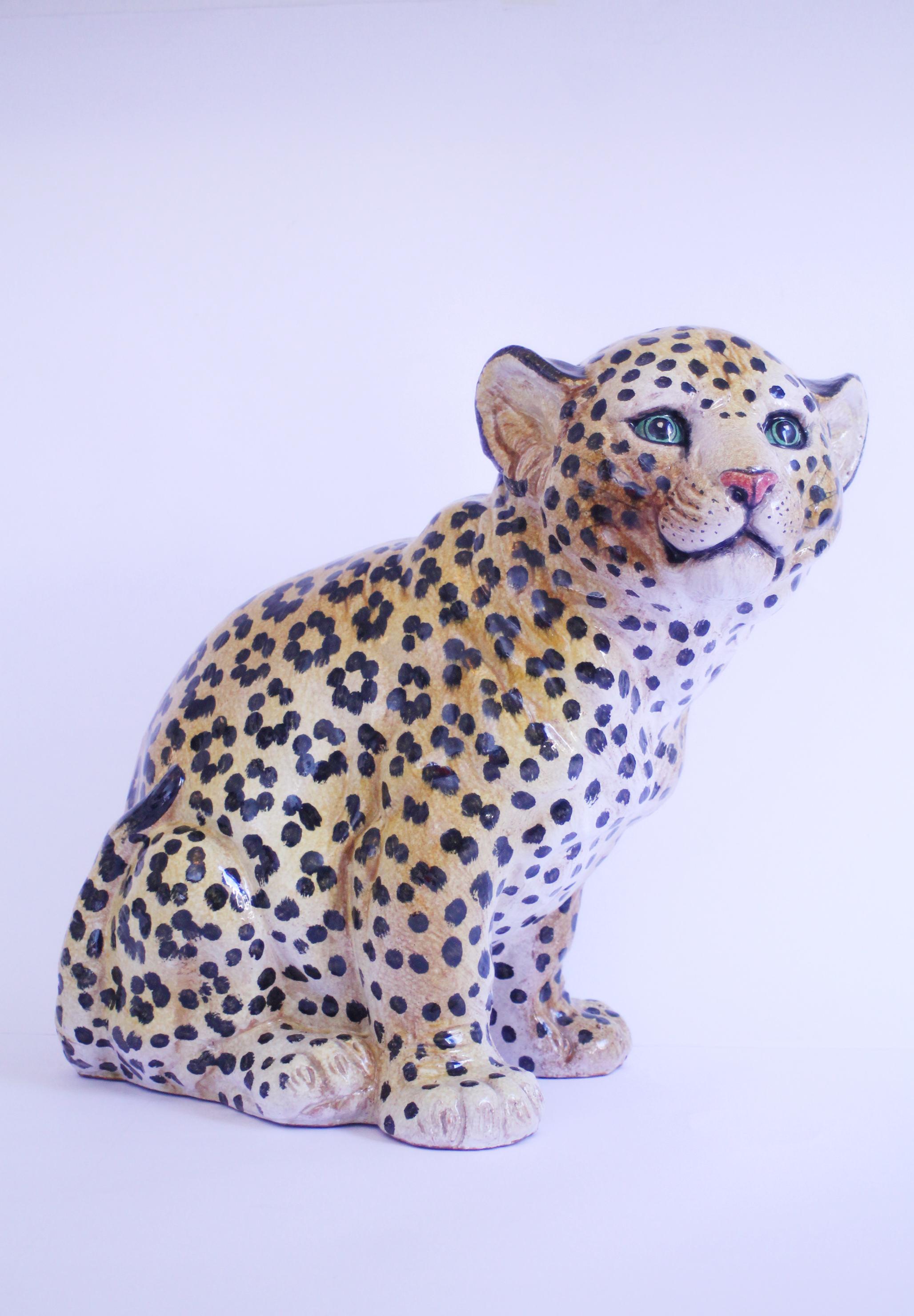 1950s hand-made Italian Majolica Leopard cub. Made in Italy!

Handcrafted + hand painted (see bottom pics)
Dimensions: 43 height x 43 x 34 cms (17x17x13in.)
Weight: 10kgs (21 pounds ca.)
Condition: Gently used, near mint with no visible cracks or