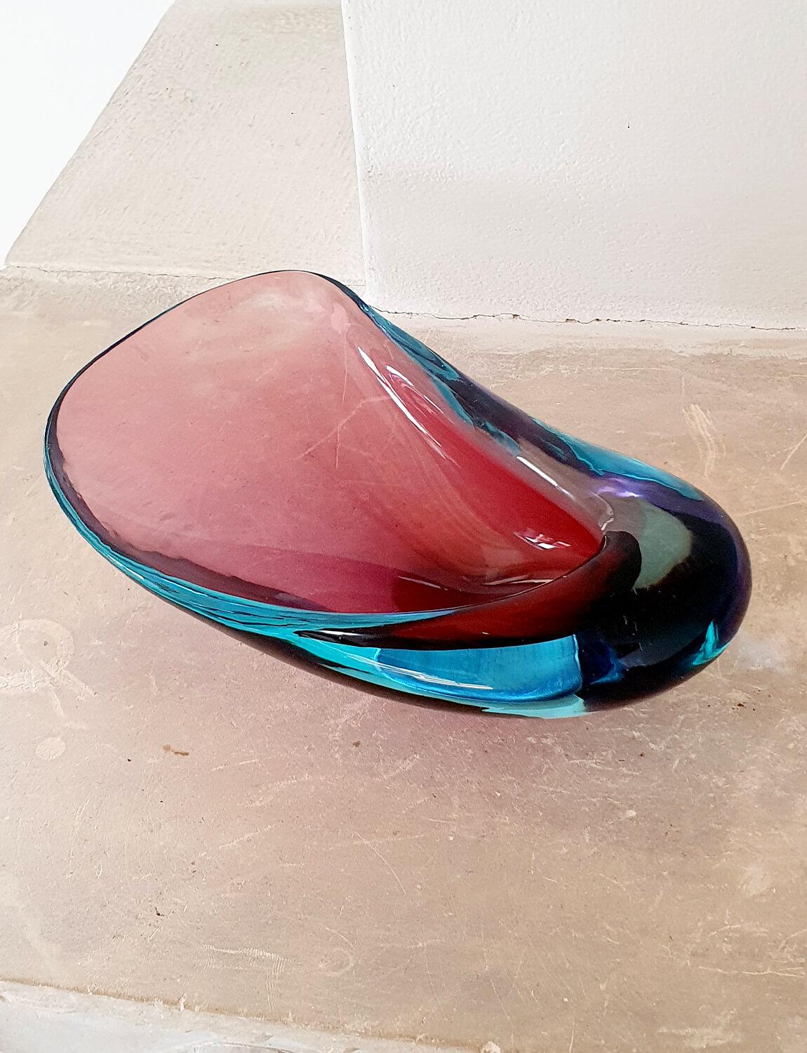 A beautiful 'Sommerso' Murano glass bowl formed in the shape of a large shell with pink central core surrounded in blue glass. This piece is by the Venetian designer, Flavio Poli and was found here in Italy. Sommerso literally translates as