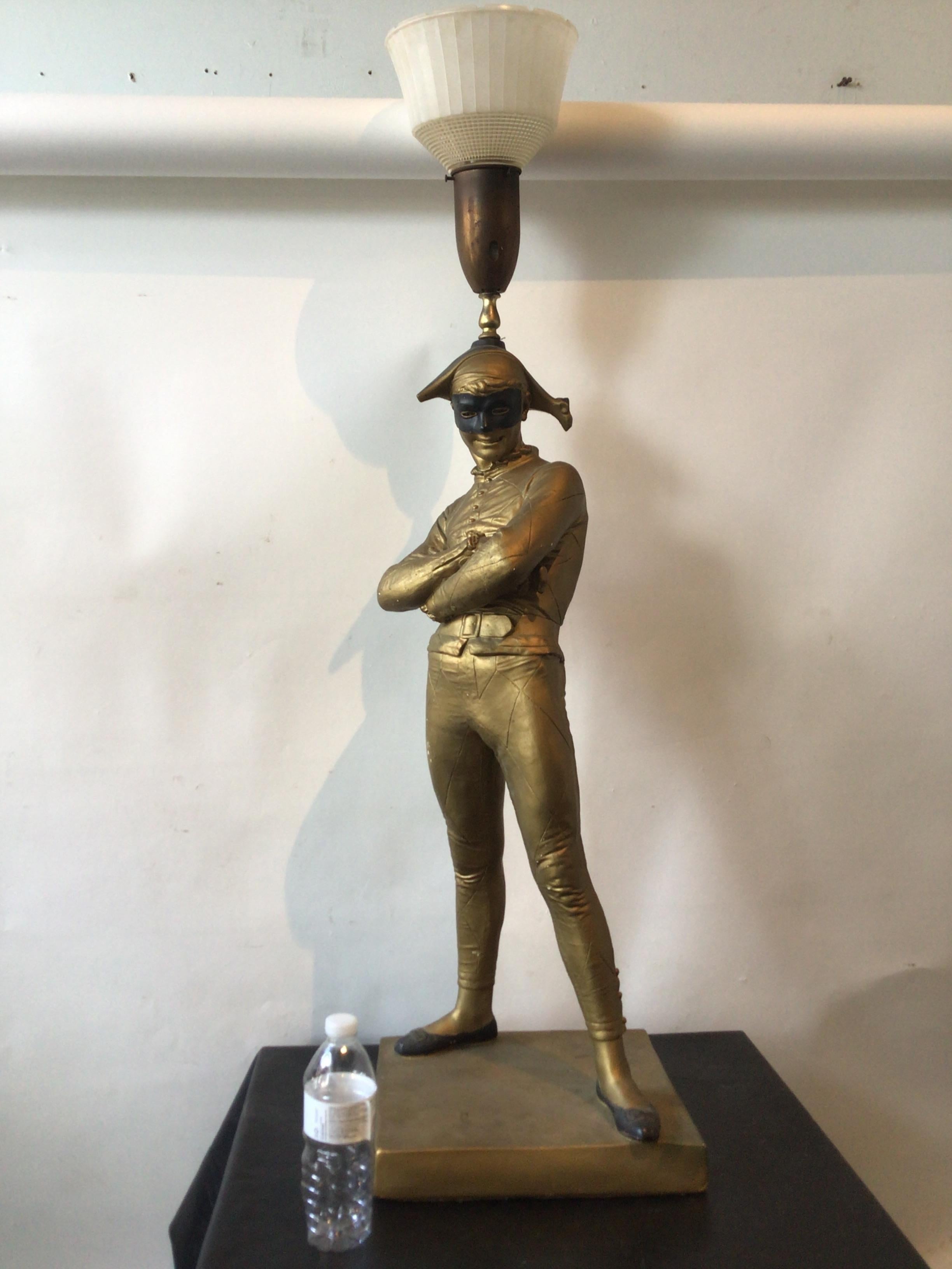 1950s Plaster harlequin lamp.
Harlequin is 34”, above the harlequins hat is another 12”. Lamp needs rewiring.