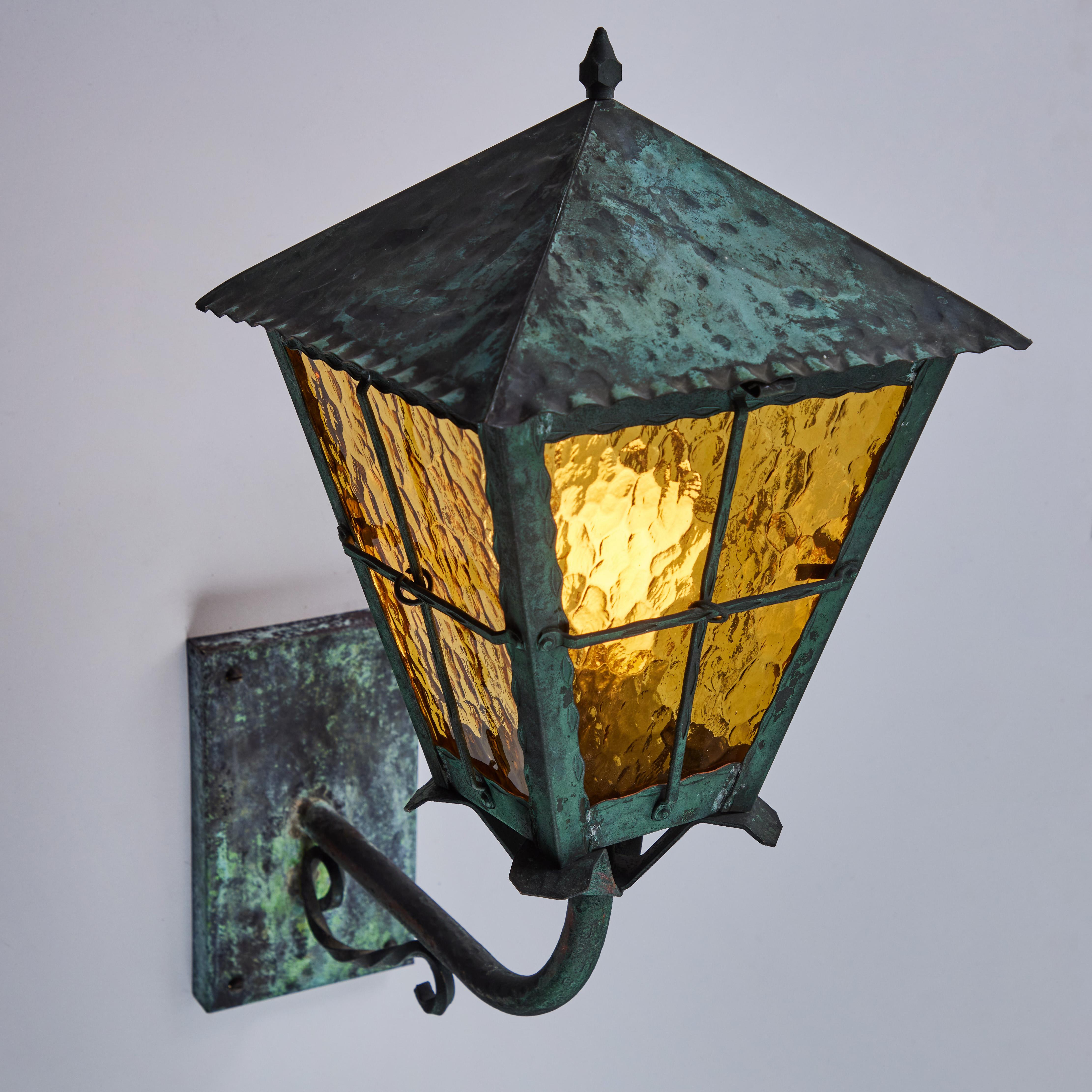 1950s large Scandinavian outdoor wall light in patinated copper and amber glass. Designer unknown. Executed in richly patinated copper and textured amber glass. A highly sculptural design, this outdoor or indoor wall light exudes Scandinavian