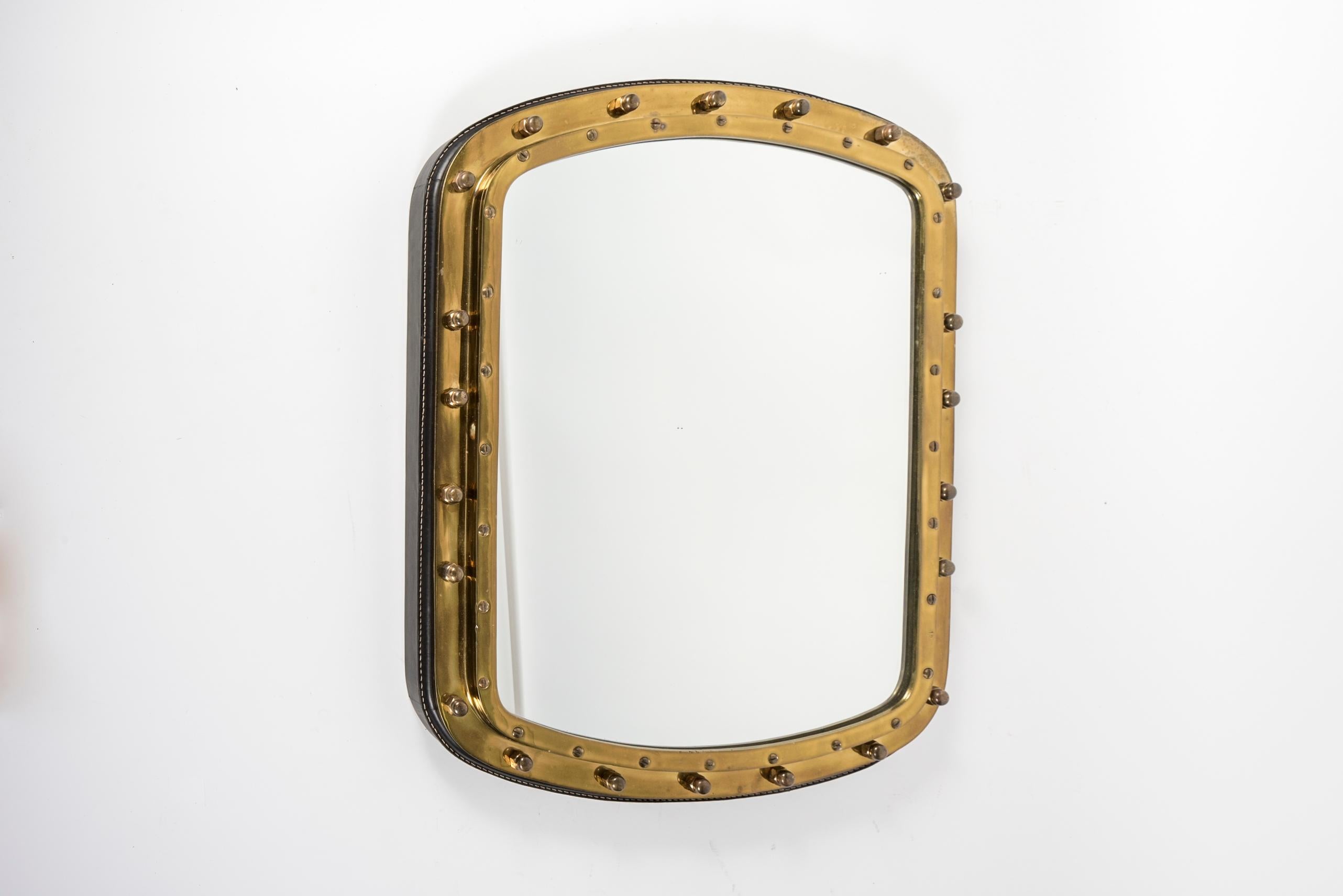 Mid-20th Century 1950s Large wall mirror in stitched leather and bronze by Jacques Adnet