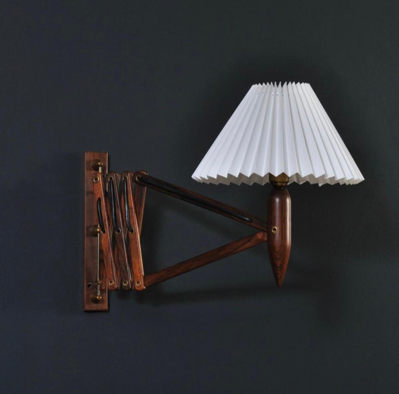 An early Le Klint Scissor extending wall lamp. Produced by Le Klint circa 1950. Re-Wired with cable to plug. 