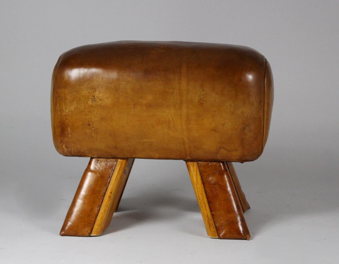 Leather gym seat from the 1950s. It is in its original condition, nice patina.

 
