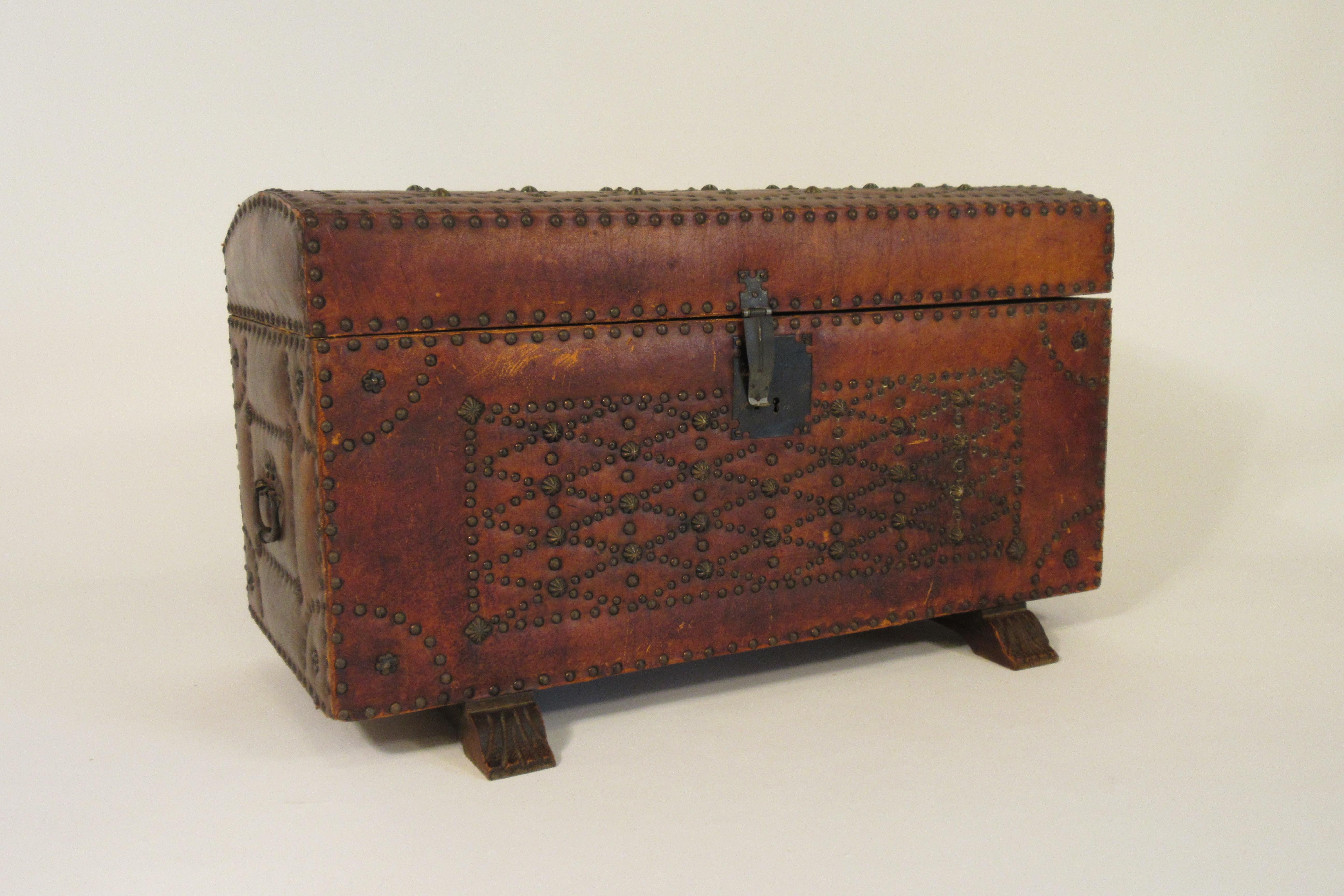 1950s leather studded dome top trunk.