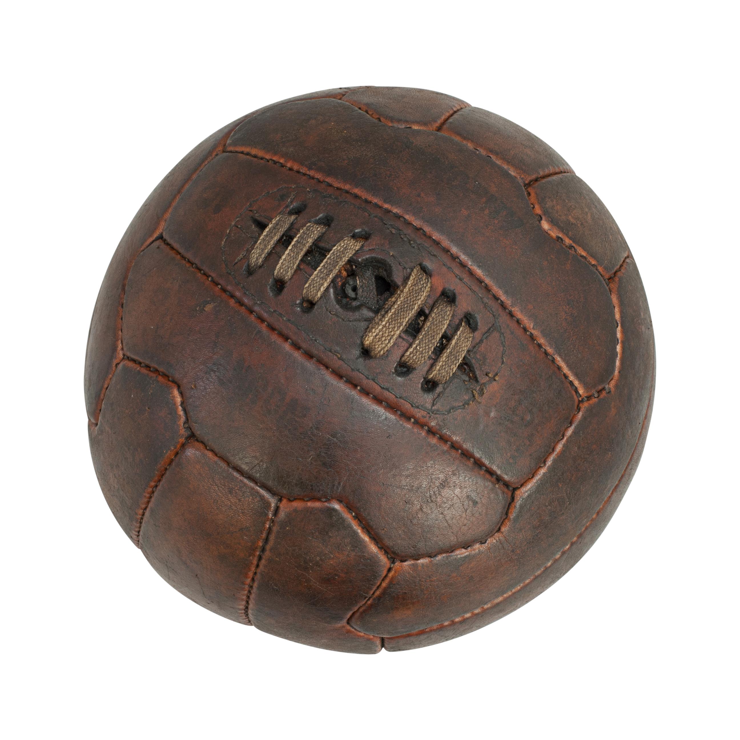 Vintage No.5 leather football.
A traditional hand sewn 18-panel zig-zag leather soccer ball in good original condition. The ball has a lace-up slit to the top to enable bladder inflation. Embossed on the leather football '5, ARIEL, hand sewn