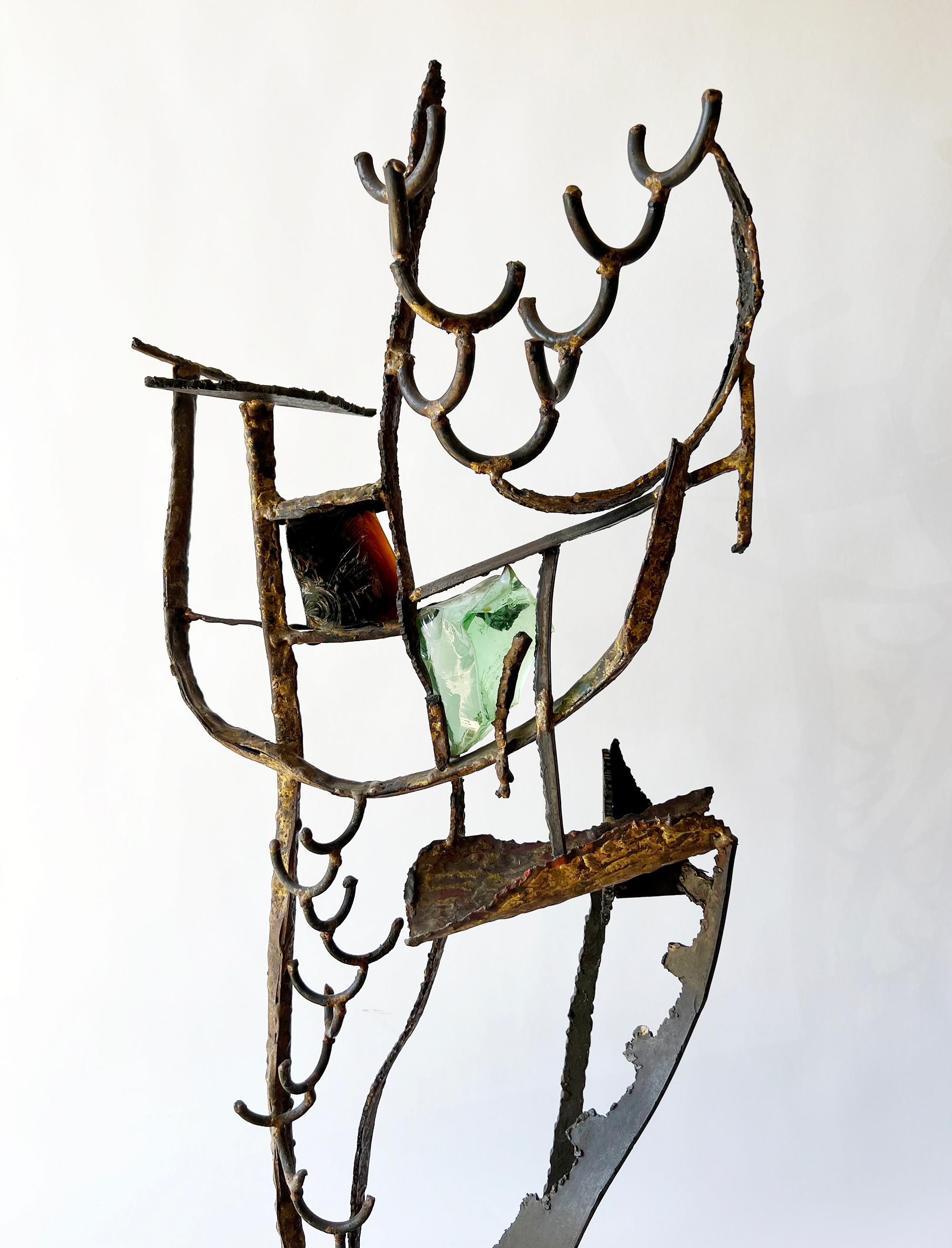 Handmade iron and glass sculpture with bronze soldering created by Leon Saulter of Los Angeles, circa 1958.  Sculpture measures 32