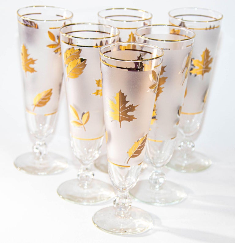 https://a.1stdibscdn.com/1950s-libbey-golden-foliage-pilsner-glass-set-of-6-frosted-with-gold-leaf-for-sale-picture-5/f_9068/f_352067721689222194105/4_Collectible_Tumbler_Vintage_1950s_Luxury_Barware_Drinking_Cocktail_Glasses_6_master.jpeg?width=768