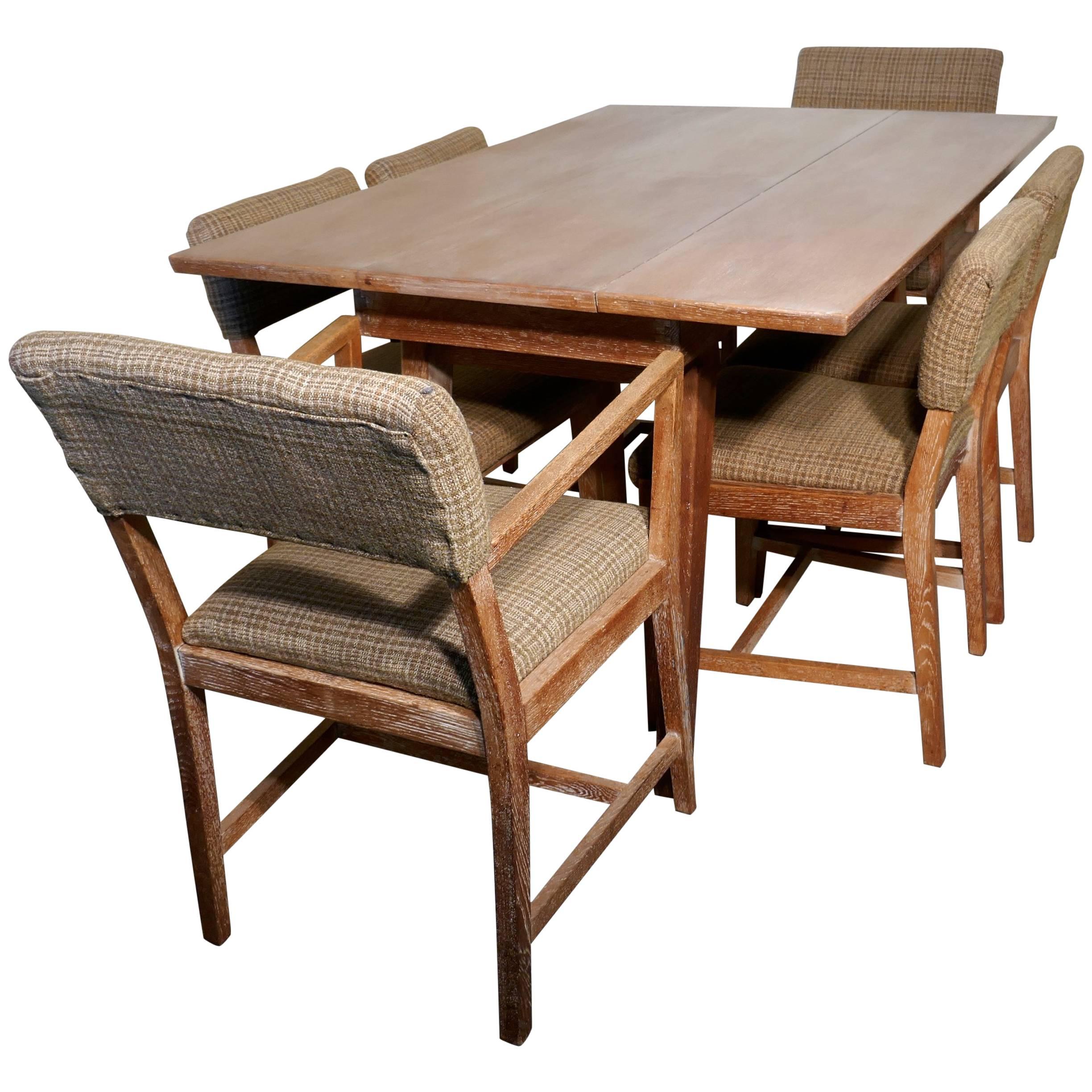 Table à manger à rallonge et ensemble de six chaises en chêne chaulé des années 1950