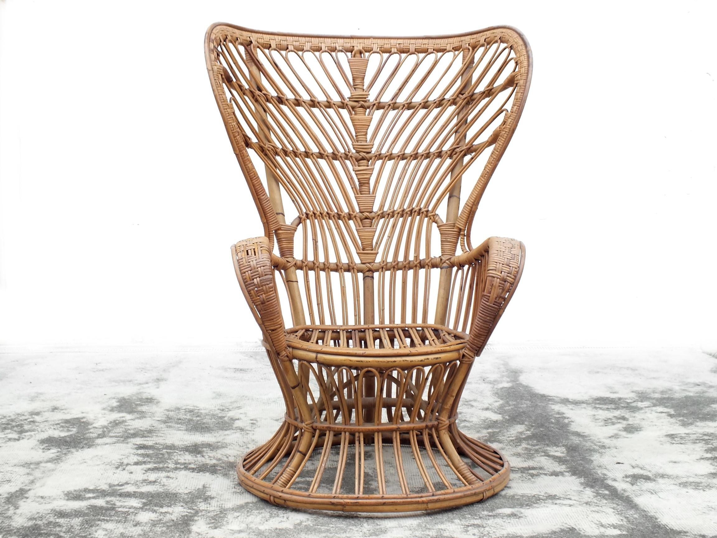 Lio Carminati and Gio' Ponti design in years '50 armchair by Casa & Giardino Italy prod.

 Very good condition with two little imperfections in the armrest, your see in the photo's.

 Material is wicker/rattan and the measure H 48 inch x W 37