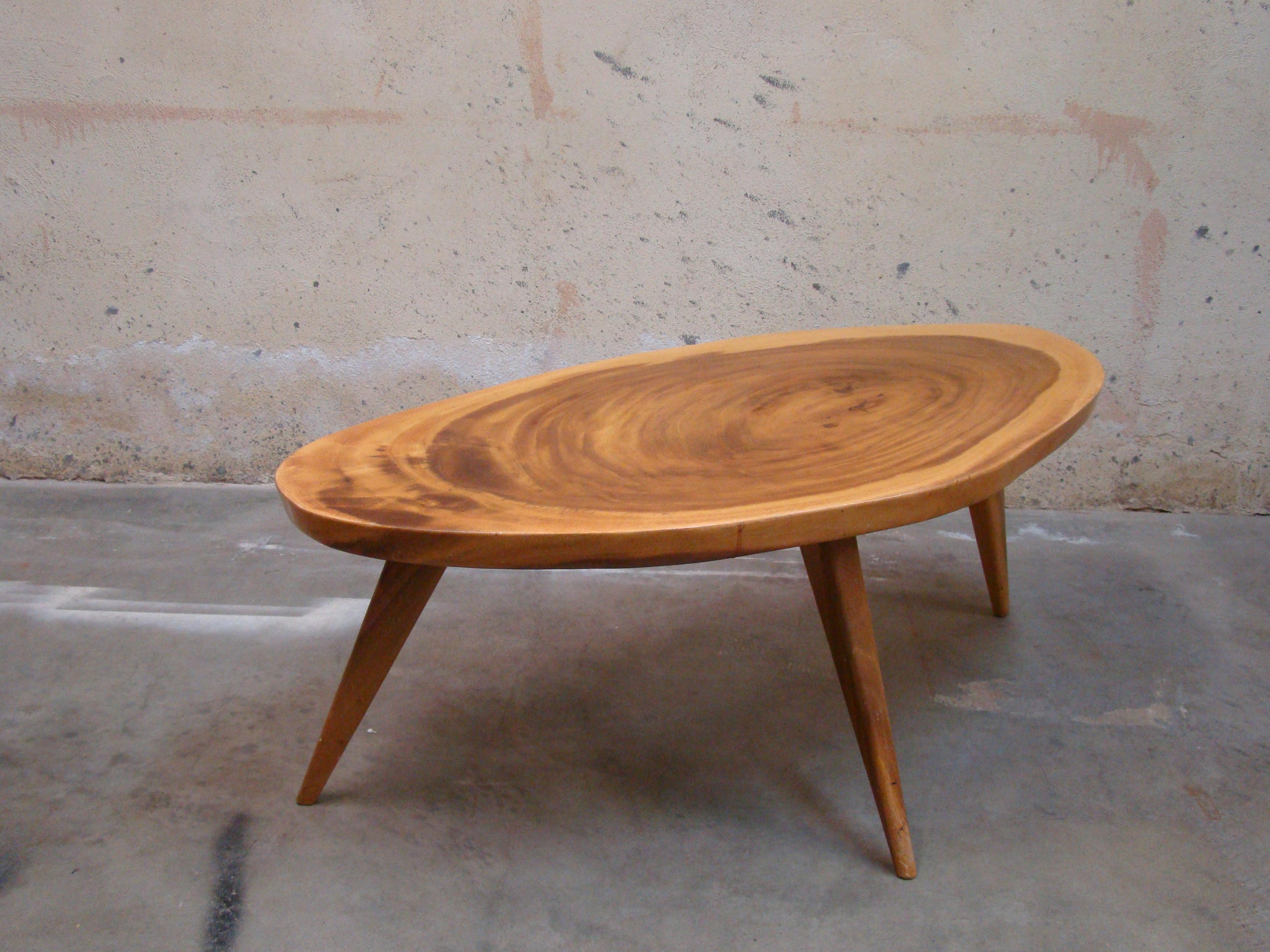 Gorgeous, live-edge table constructed in Hawaii of indigenous 'Monkeypod' wood. These tables were produced in the mid-1950s and 1960s of hand-selected, cross-cut slabs that showcased the unique 'motion' in the grain of the heartwood.

Not as