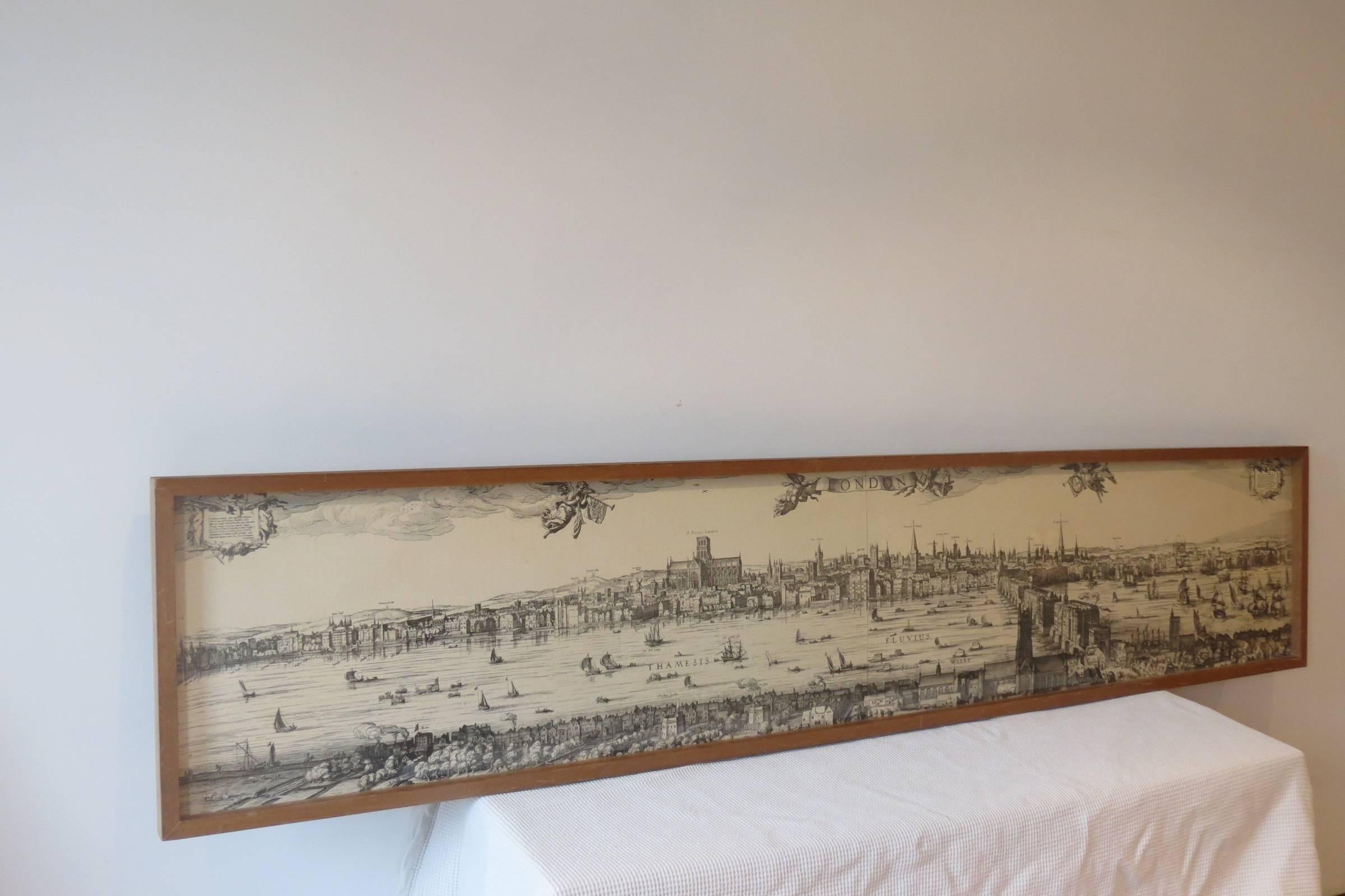 Vintage print of Old London Town. Picture dates from the 1950s and shows Old London Town with the major landmarks. 

Paper on board with plastic film cover and Mahogany frame, plywood back. The paper print is joined in the centre as shown in the