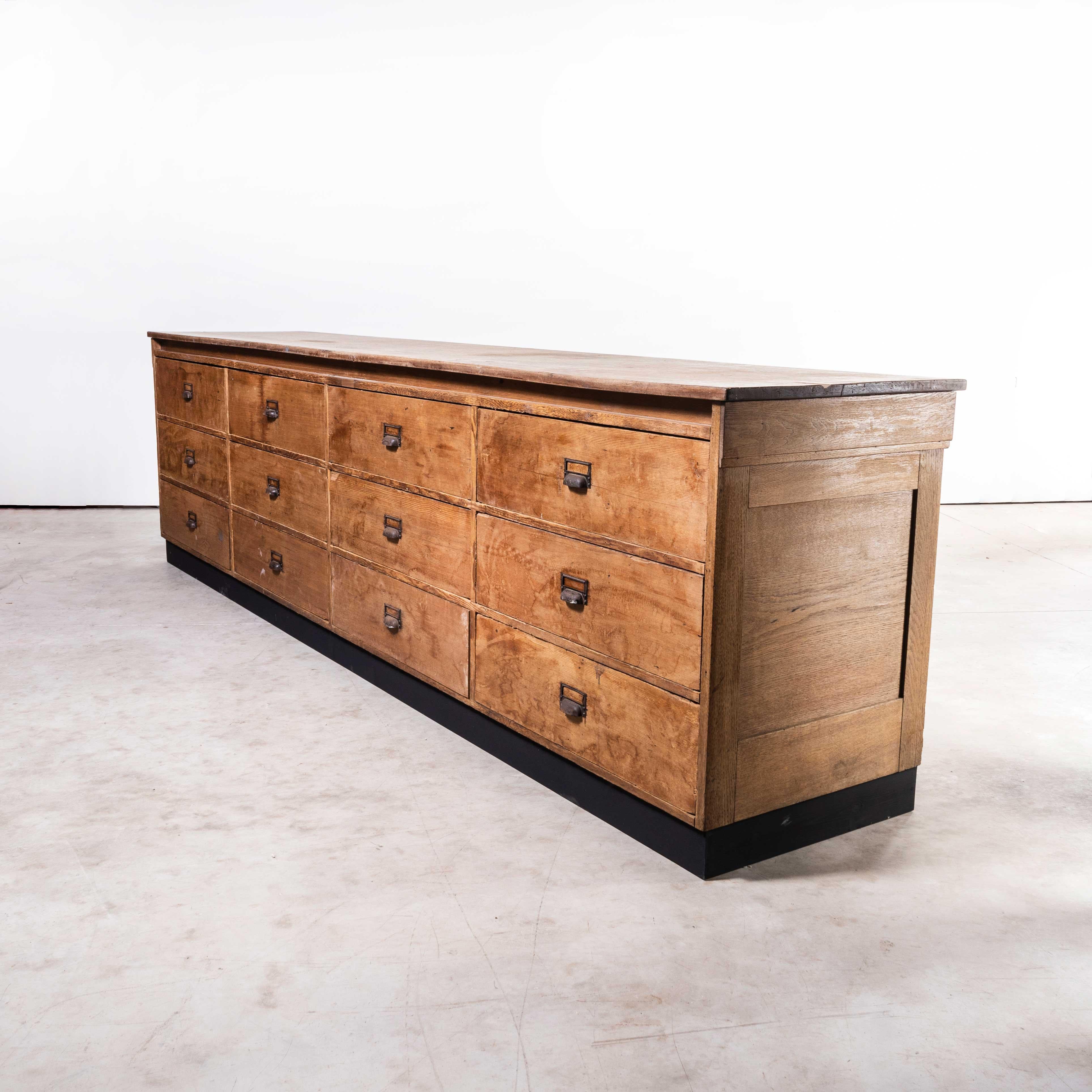 1950s long low large twelve drawer pine worshop bank of drawers
1950s long low large twelve drawer pine worshop bank of drawers. Wonderful large three metre workshop bank of drawers made with clear pitch pine throughout with a heavy well figured