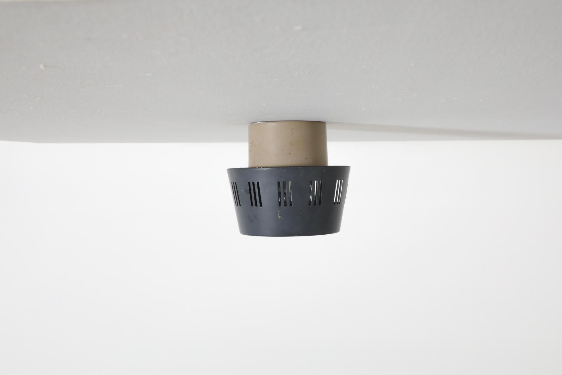 Enameled 1950's Louis Kalff Flush Mount Ceiling Lamp with Linear Cut-Outs for Philips For Sale