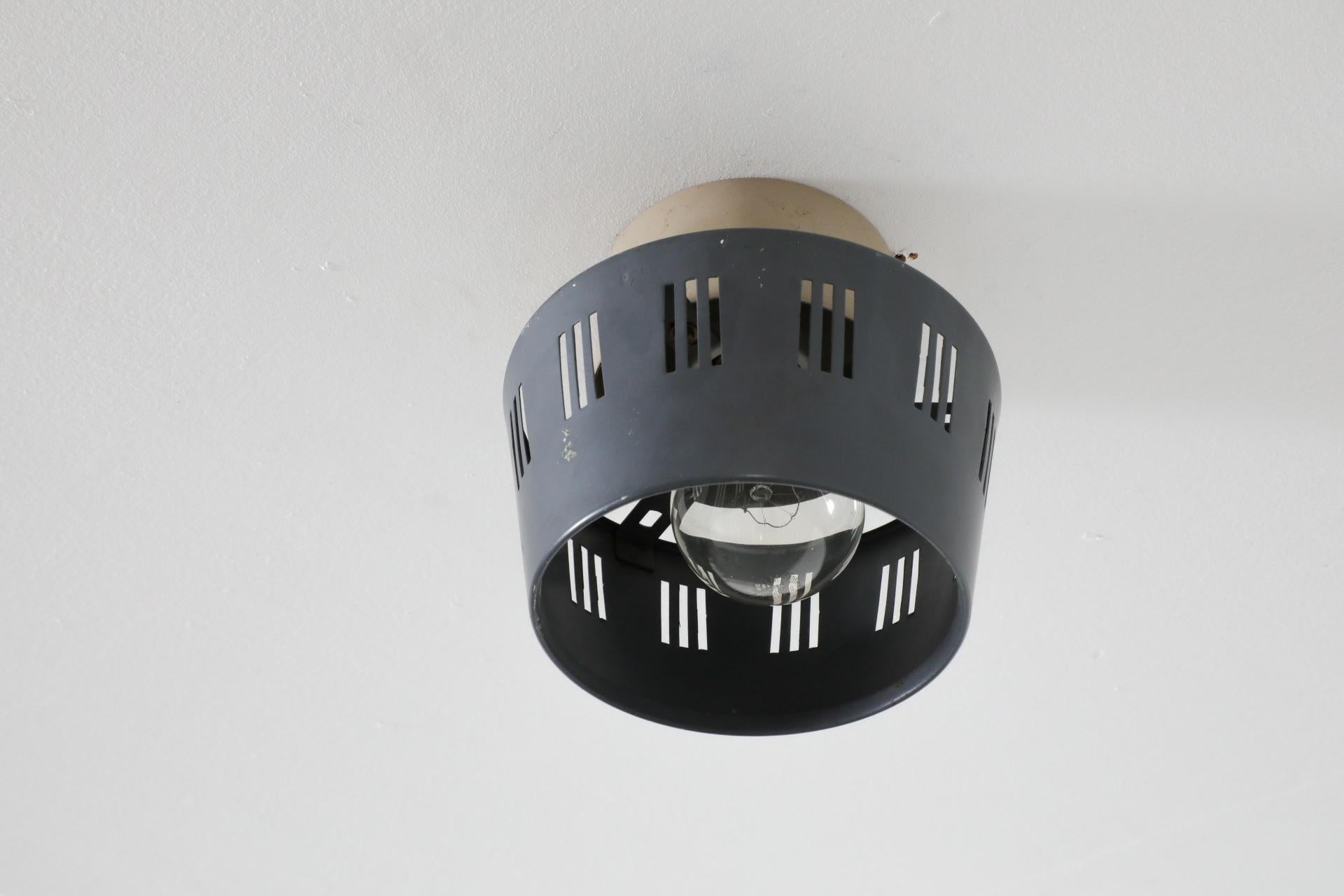 1950's Louis Kalff Flush Mount Ceiling Lamp with Linear Cut-Outs for Philips In Good Condition For Sale In Los Angeles, CA