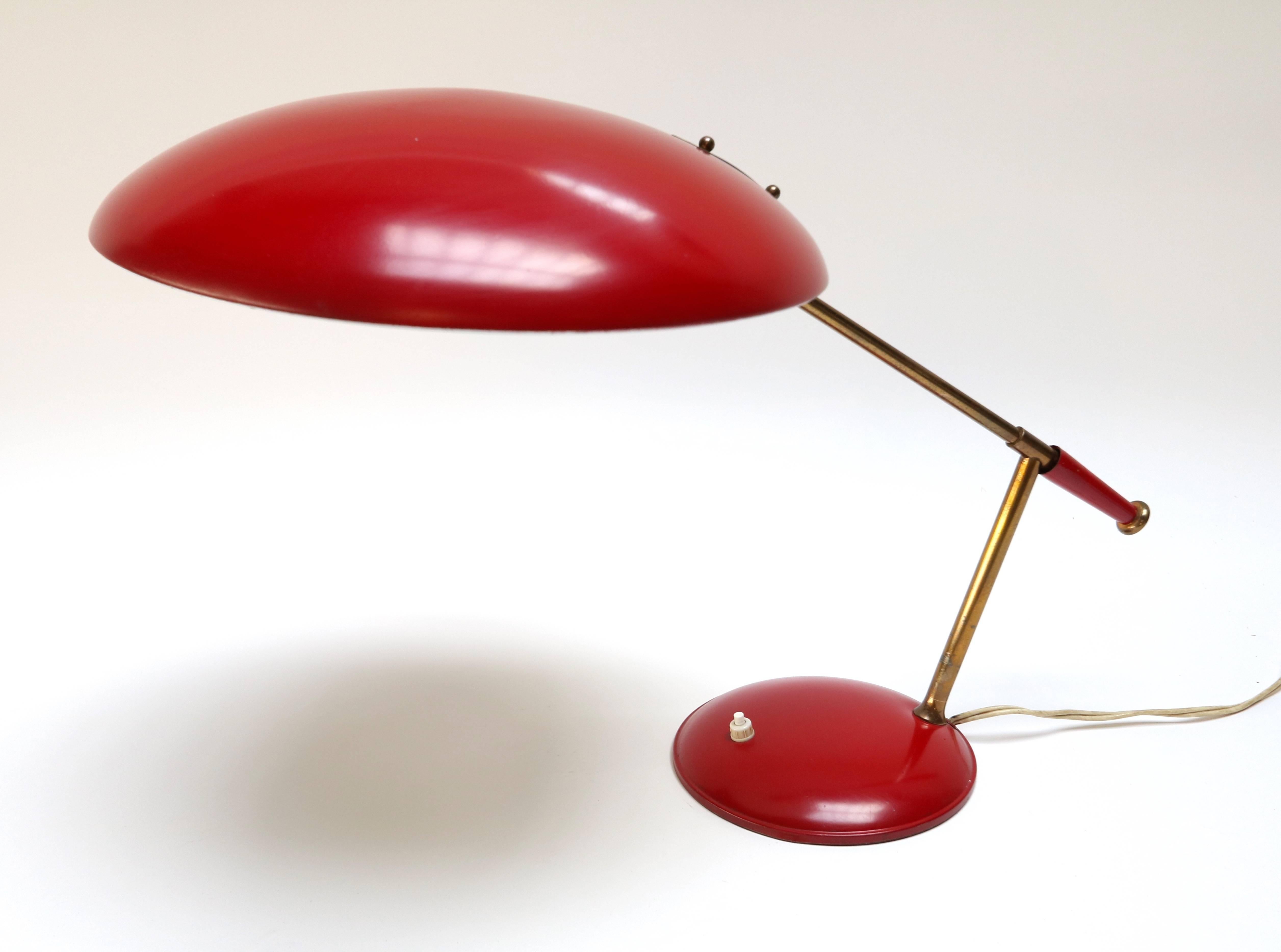 1950s Louis Kalff for Philips table or desk lamp in red metal and brass.