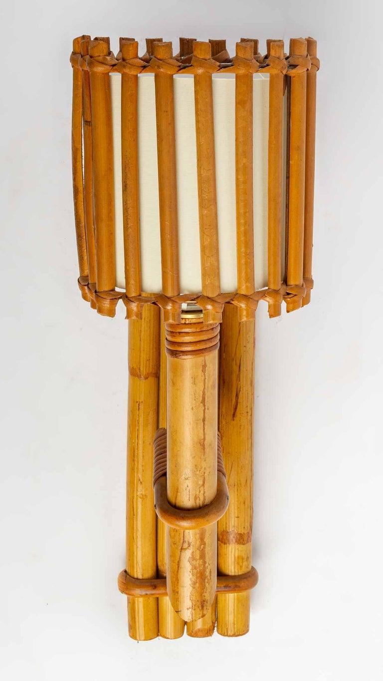Mid-20th Century 1950s, Louis Sognot Pair of Rattan Sconces