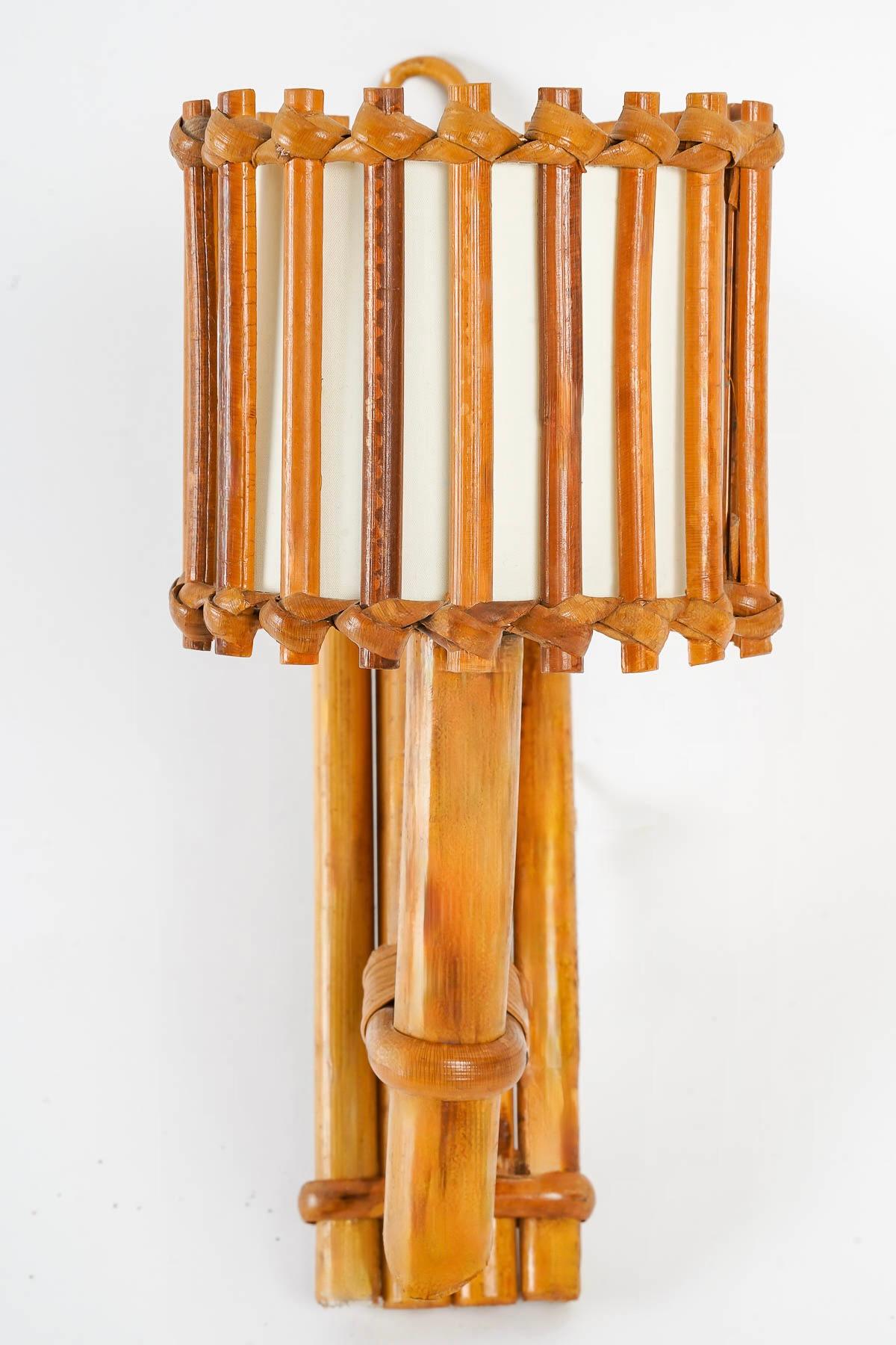 Mid-20th Century 1950s, Louis Sognot Pair of Rattan Sconces For Sale