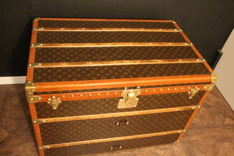 Sold at Auction: LOUIS VUITTON STEAMER TRUNK Exterior with allover LV  monogram, beechwood slats, brass locks and hardware, and original casters.  One