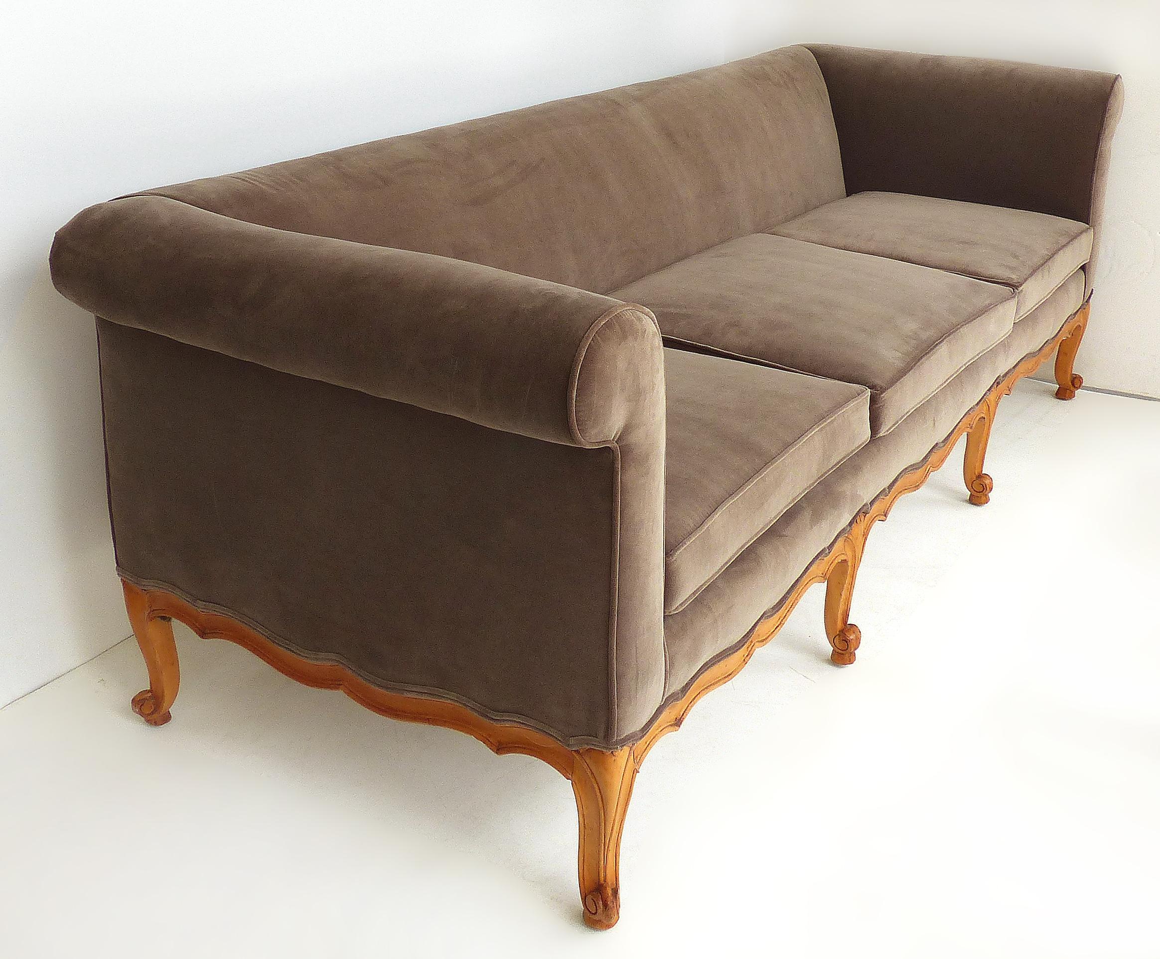 1950s Louis XV style mohair newly upholstered sofa with scalloped wood apron

Offered for sale is a Louis XV style sofa upholstered in mohair velvet. The circa 1950s sofa has a scalloped wood apron and we are also showing a photograph of an