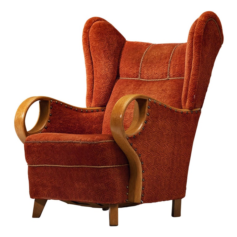 Lounge-Sessel aus den 1950er Jahren mit flügelartigen „Ohren“ und geschwungenen Armlehnen im Angebot bei 1stDibs Deutschland