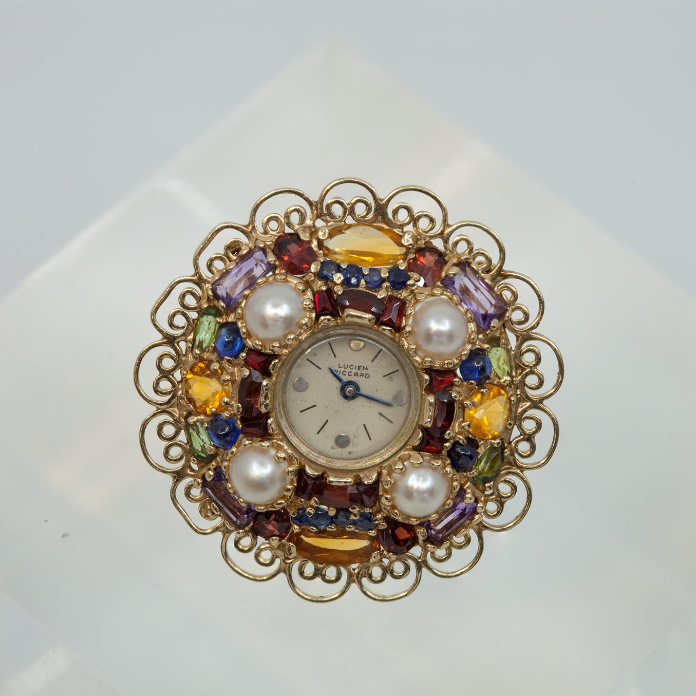 De las mujeres Años 50 LUCIEN PICCARD Broche de reloj de oro amarillo de 14 quilates con varias piedras preciosas en venta