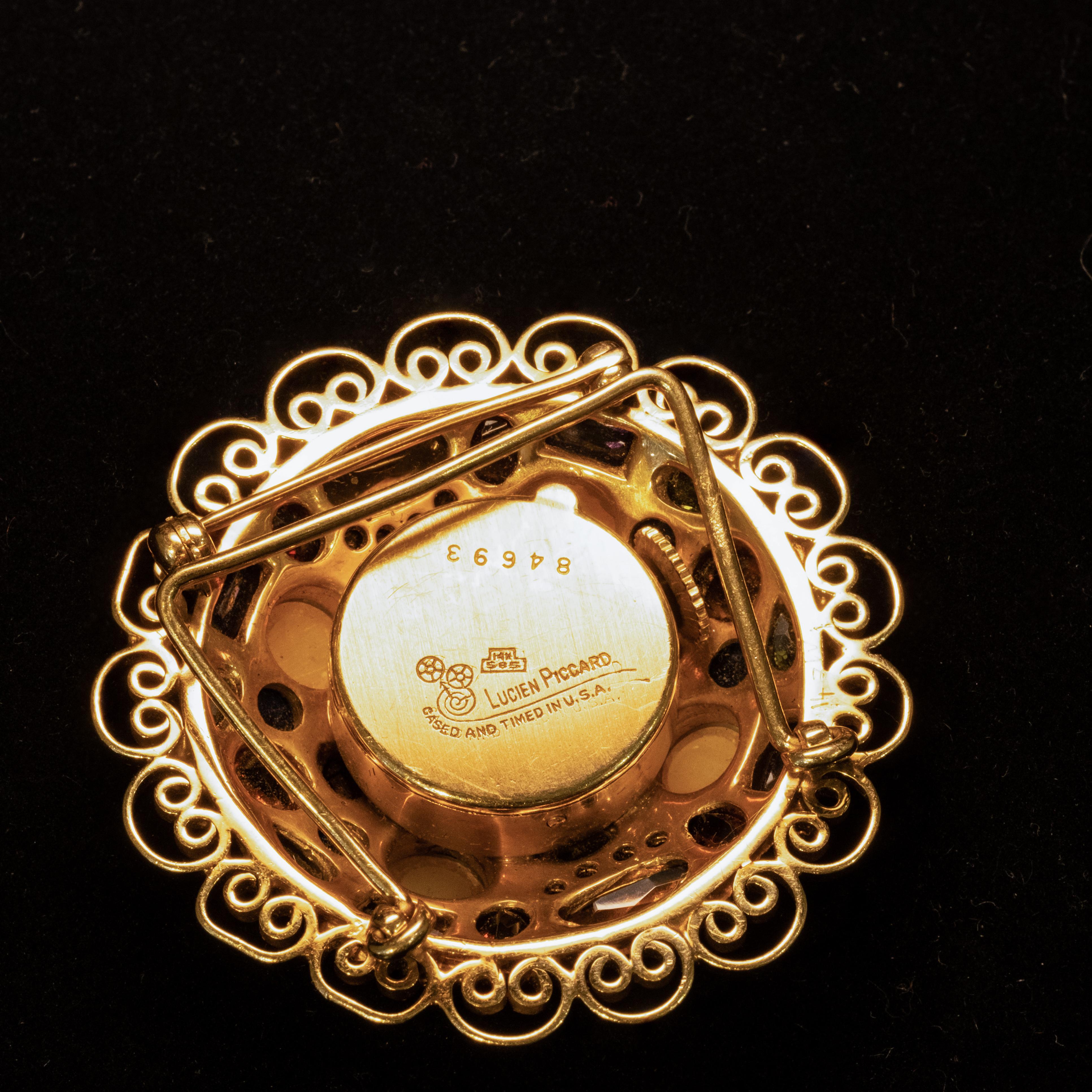 Años 50 LUCIEN PICCARD Broche de reloj de oro amarillo de 14 quilates con varias piedras preciosas en venta 2