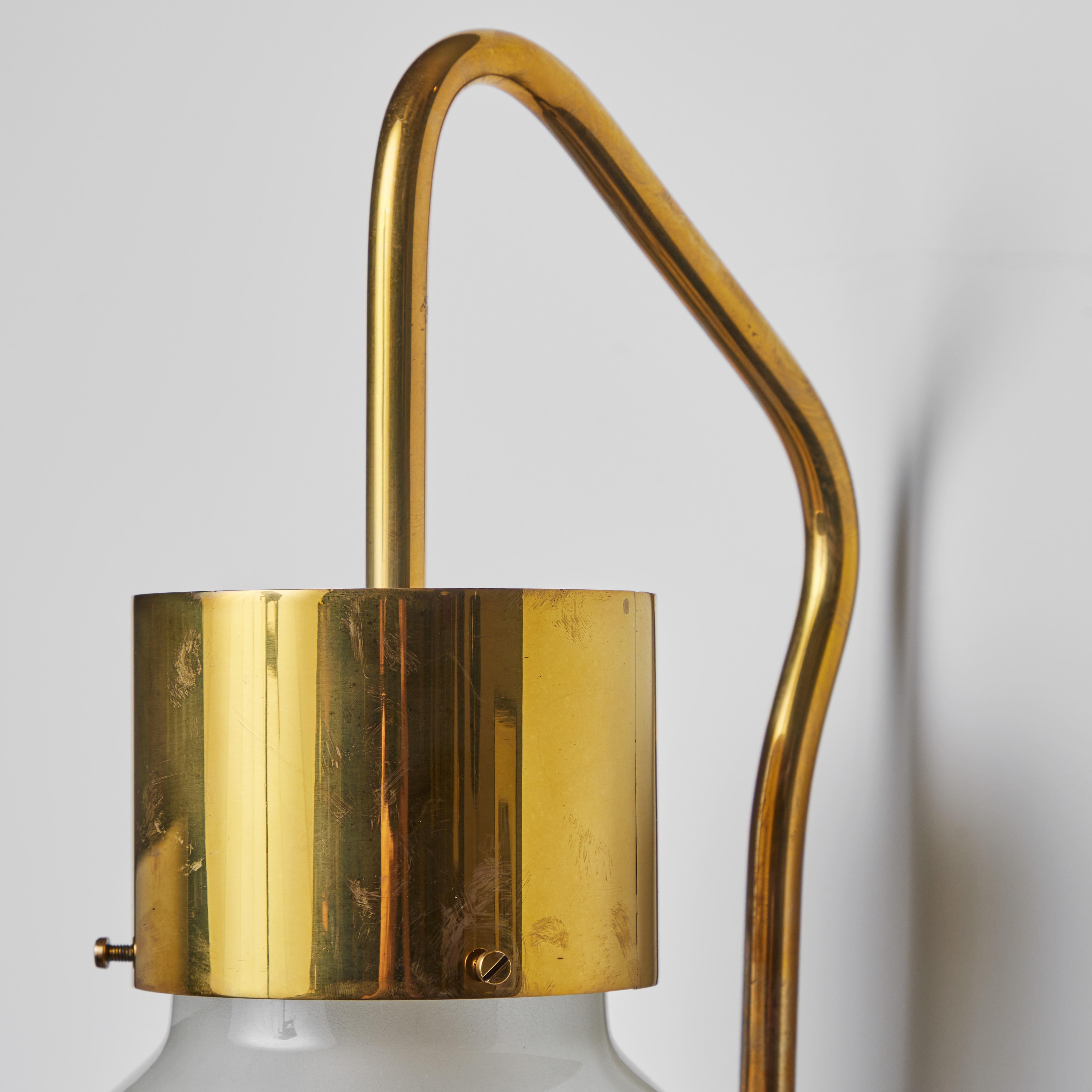 Large 1950s Luigi Caccia Dominioni 'LP 10' wall light for Azucena. Exceptionally rare and beautifully sculptural wall lamps executed in architectural brass and opaline glass, Italy, circa 1958. An incredibly refined and still quite modern design by
