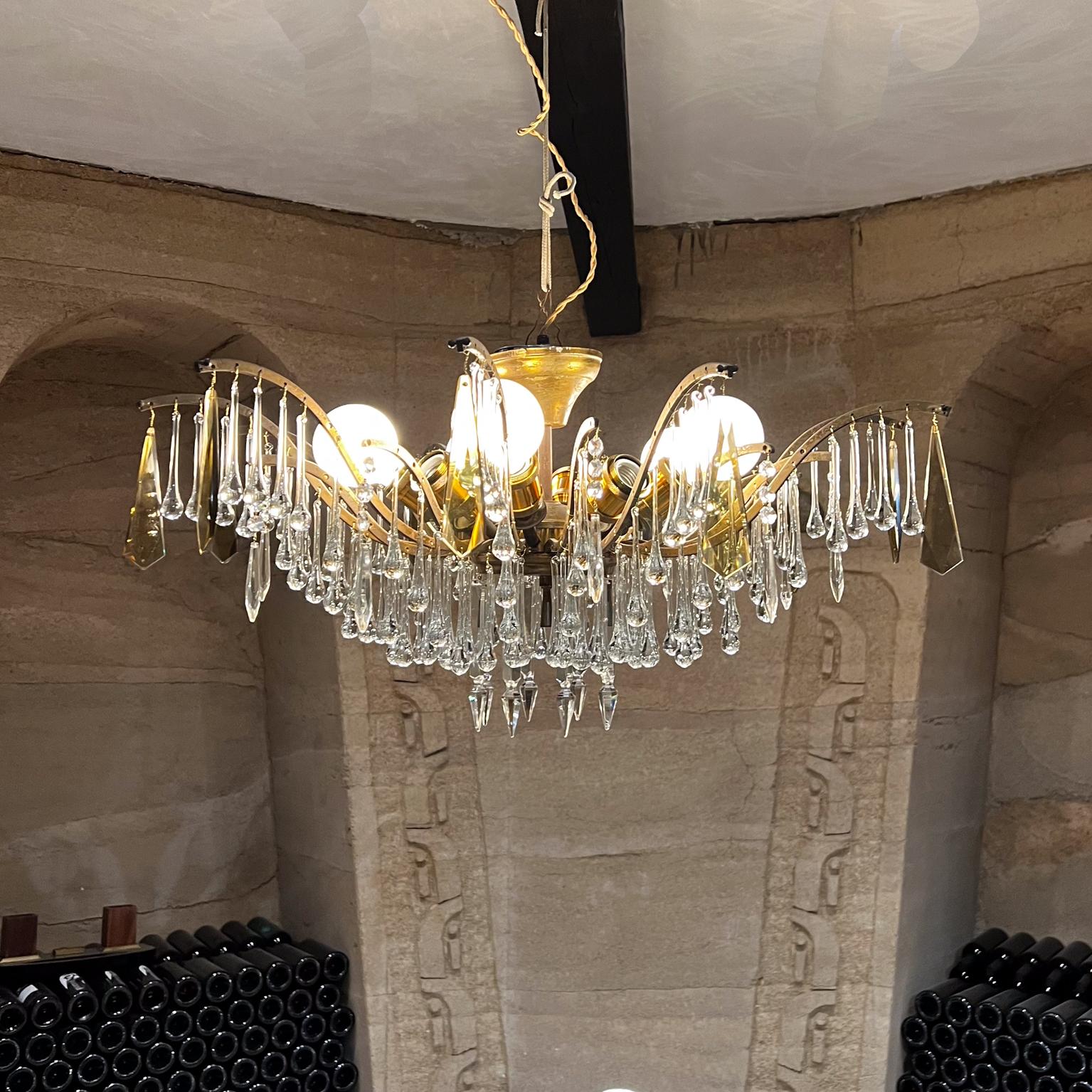 1950s Luxurious Murano Teardrop Crystal and Bronze Chandelier
Ten light design
Unmarked
15 tall x 32 diameter
Rewired. New sockets.
It requires 10 bulbs which are not included.
Original preowned condition.
Refer to images provided.
