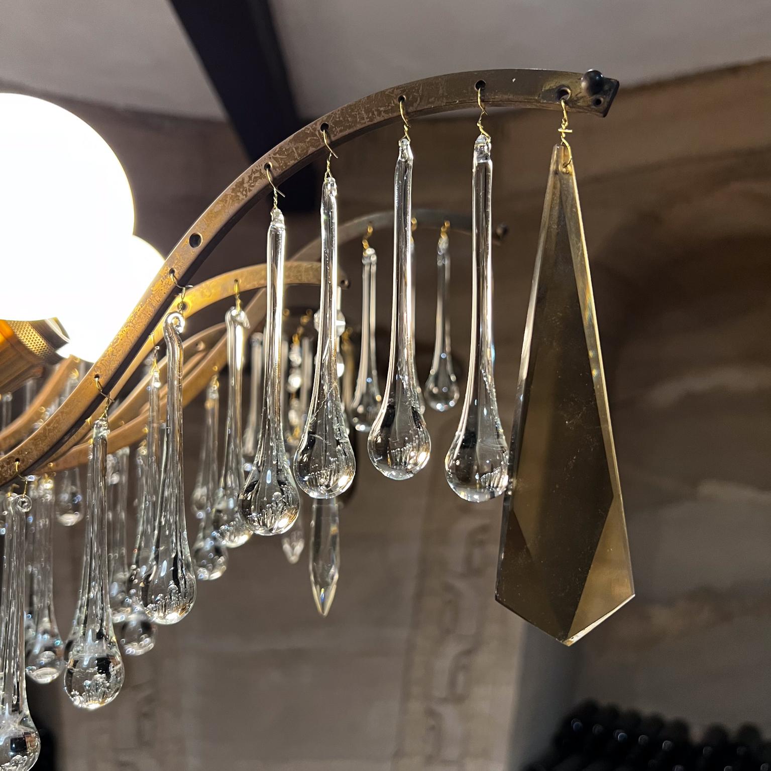 Laiton Lustre à dix lumières en cristal de Murano et bronze en forme de goutte d'eau, années 1950 en vente