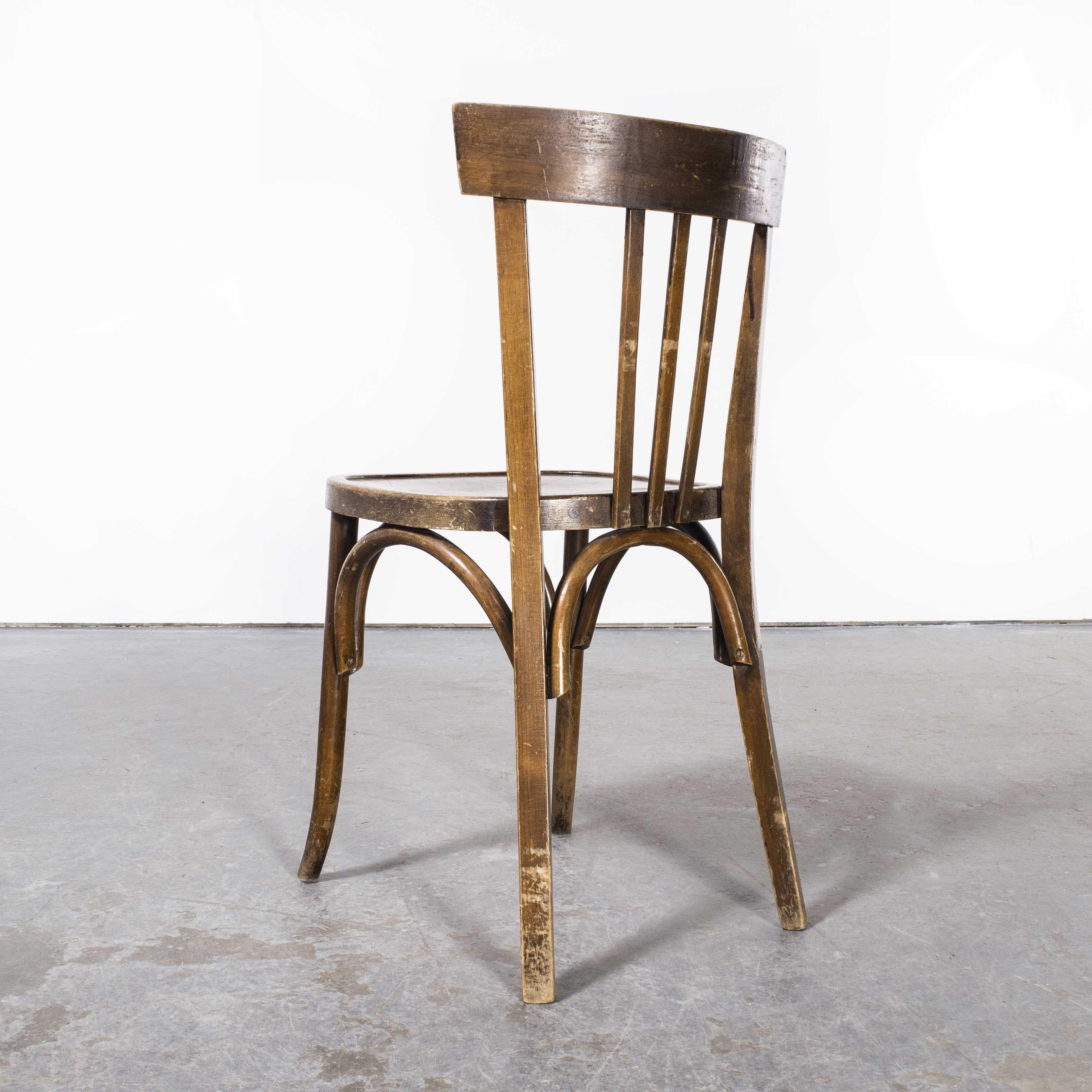 1950’s Mahieu bentwood dark tan dining chairs – set of sixteen
1950’s Mahieu bentwood dark tan dining chairs – set of sixteen. Classic early beech bistro chair made in France by the maker Mahieu. Not much is known of the history of Mahieu except