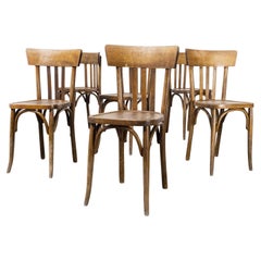 Trois chaises de salle à manger Mahieu en bois cintré, ensemble de six pièces, années 1950