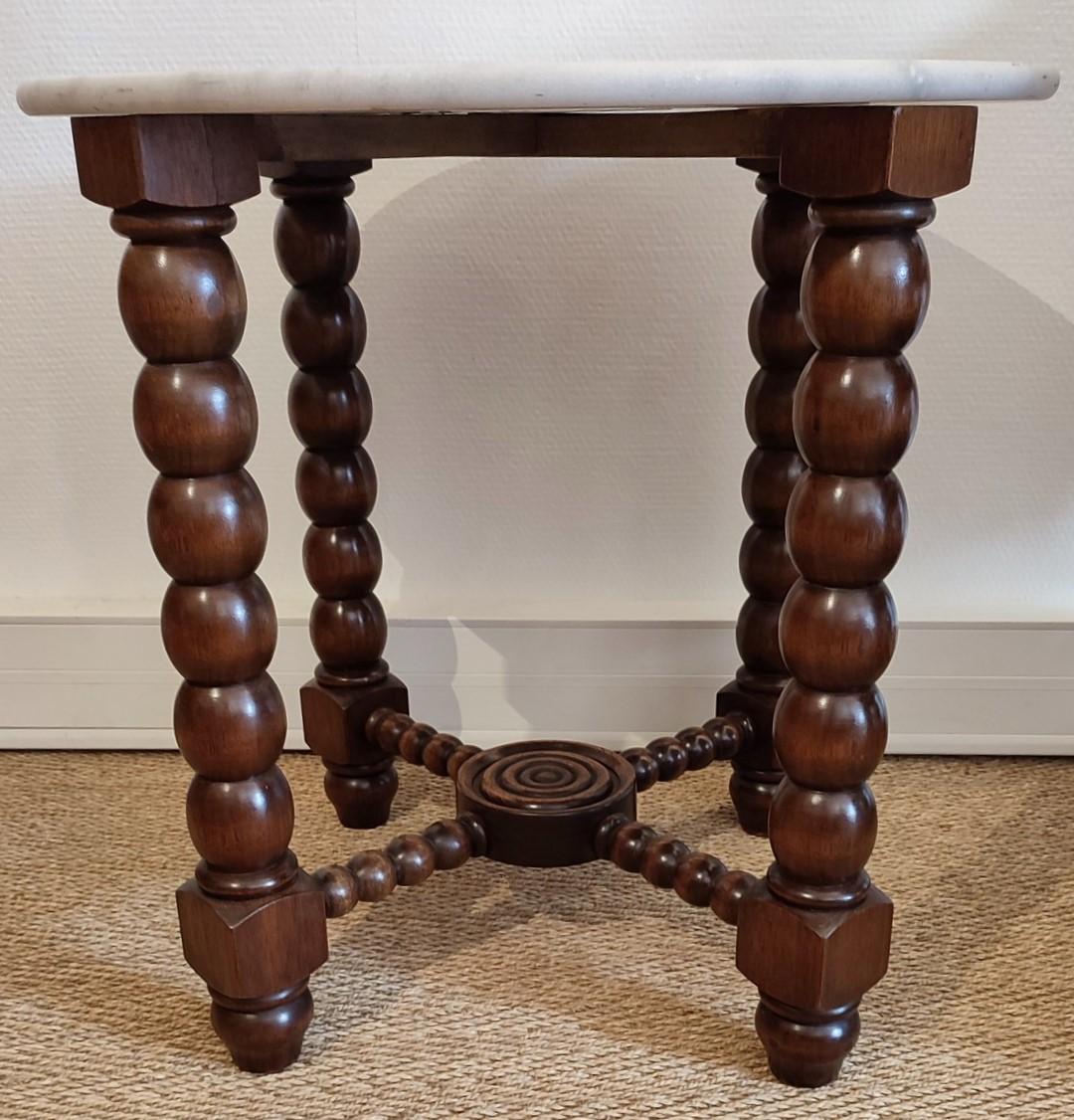 Mahogany Beaded Gueridon with marble top. Very warm Colors and Gorgeous Patina.
Inspired by Works of Gascoin or Dudouyt, Major French Designers of Mid 20th-Century.