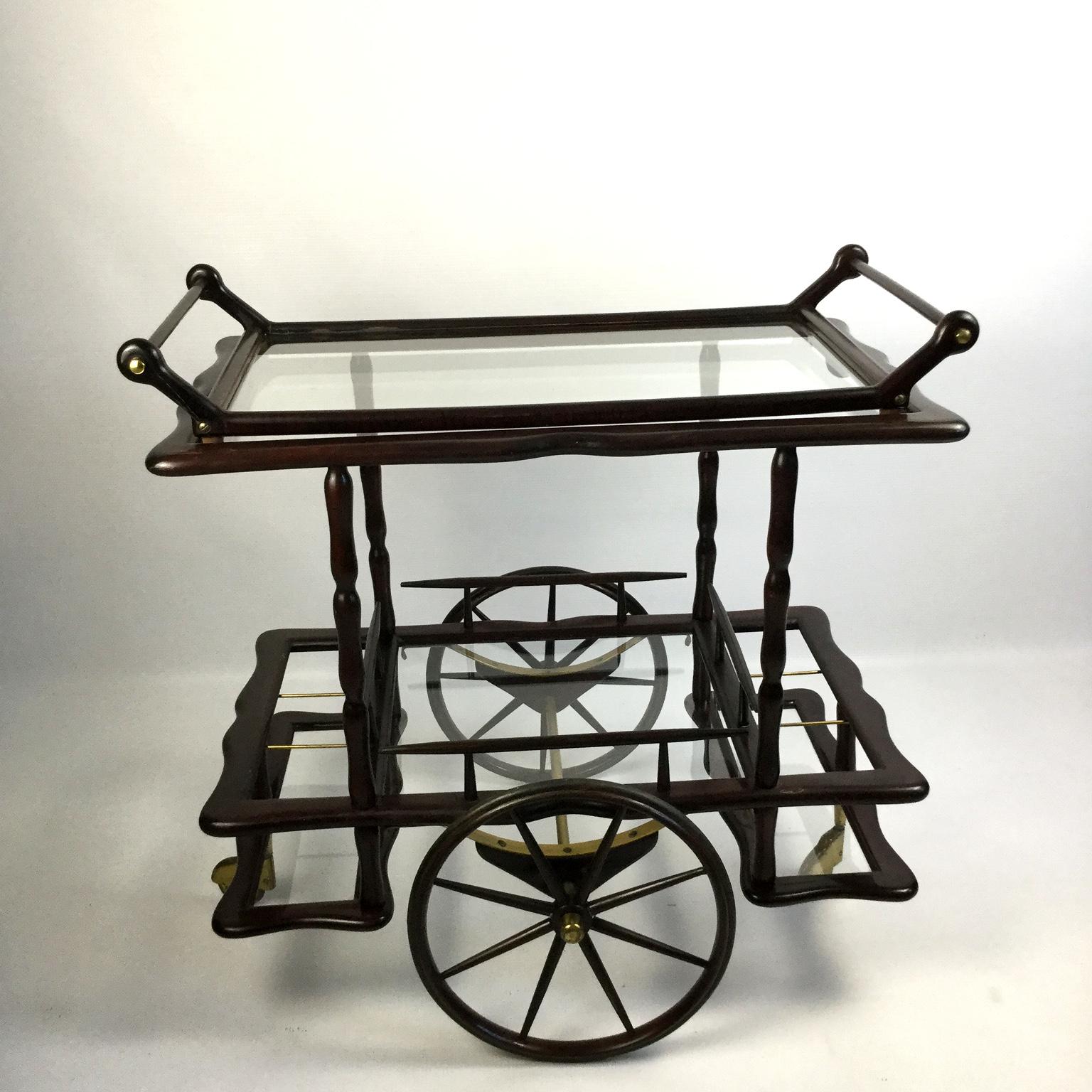 The 1950s Italian mahogany drinks trolley or bar carts, attributed to Cesare Lacca, with removable tray and two nicely brass wheels finish.