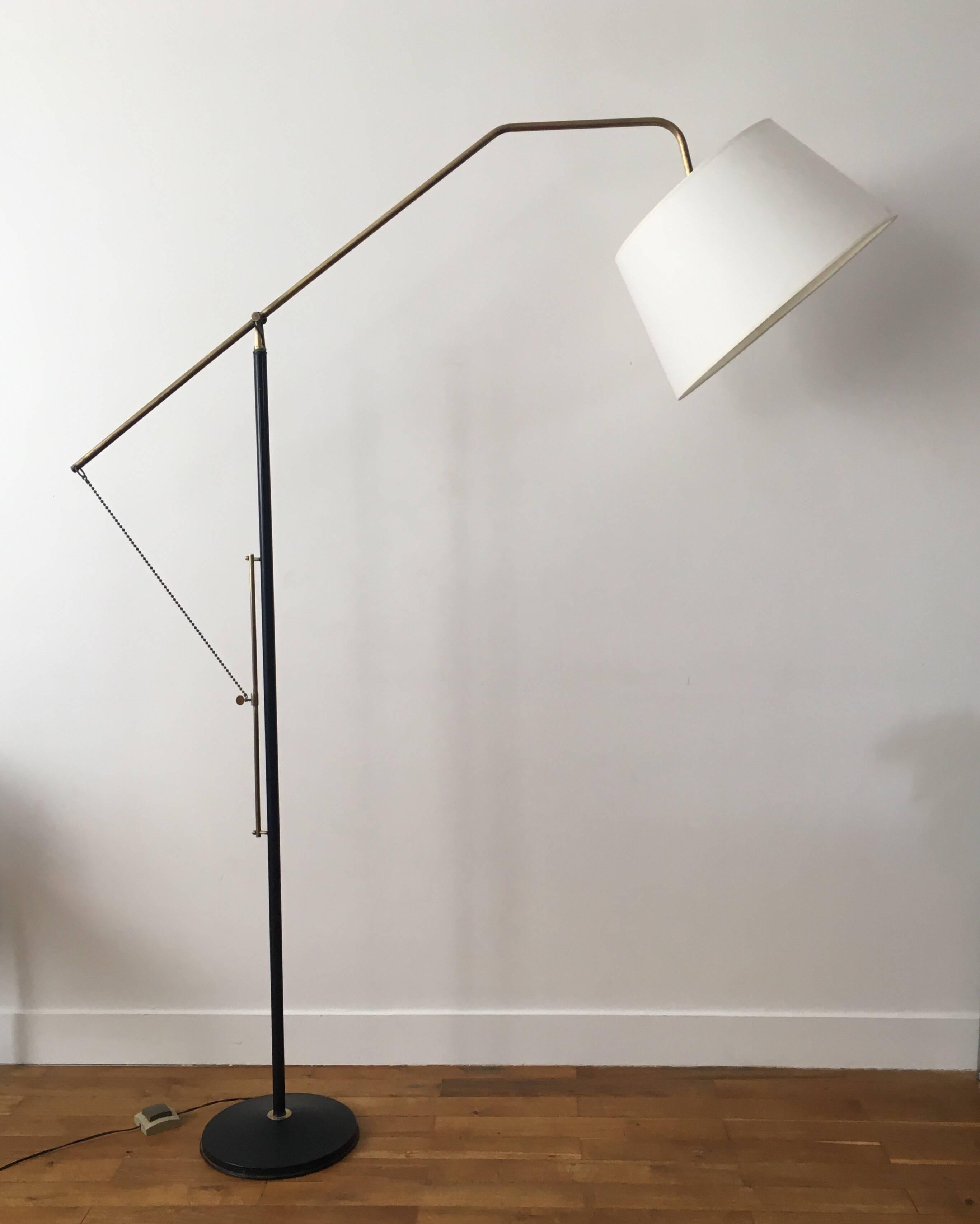 Rare adjustable floor lamp by Maison Arlus in black painted metal and gilded brass, circa 1950.
Interesting adjustable system.
The head (shade part) is also adjustable.
The height can be adjusted from 120 cm to 205 cm.



 