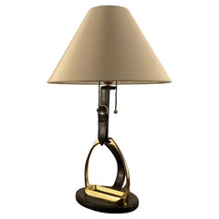1950s Maison Longchamp Table Lamp in Stitched Leather with a Brass Stirrup