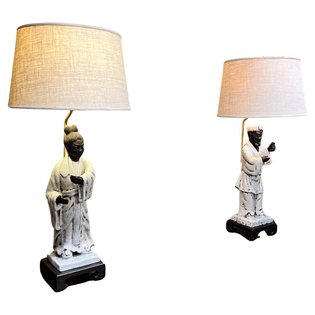 Italy 1950s Marcello Fantoni Asian Figural Table Lamps 
Italian Glazed Ceramic with Enamel Finish Brass Wood
Signed
Finely Carved Man & Woman Traditional Robe
Square Base Plinth 
33 h to socket x 8 d x 8 w
New cord socket and plug
No shades are