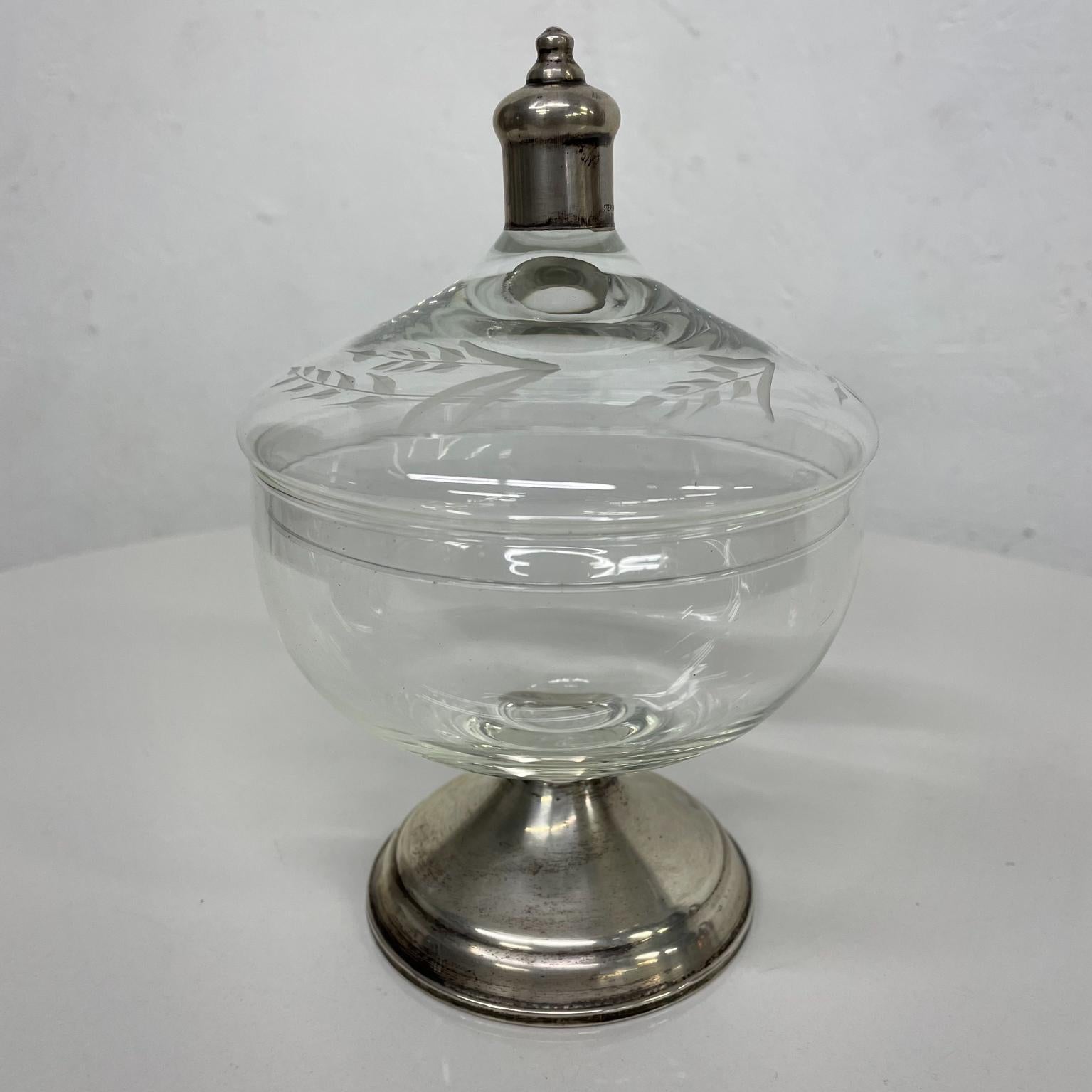 Delightful old time Duchin Creation sterling silver and etched glass covered candy dish by Maurice Duchin New York
Measures: 6.75 height x 4.5 diameter inches.
Maker stamped.
Preowned unrestored good vintage condition. Patina present.
Refer to