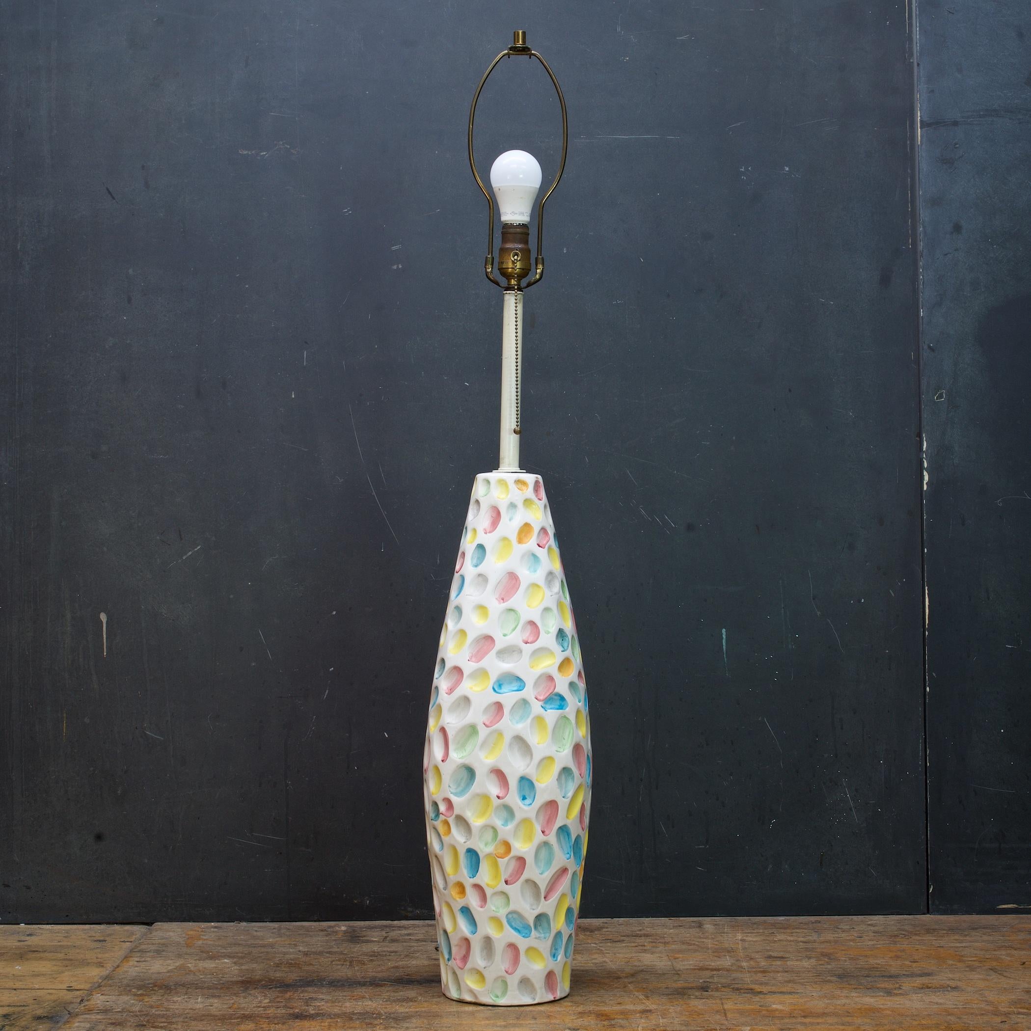 A few flecks to the glaze, but that is it this lamp is incredible, you will love it, so colorful and whimsical. A fully functional lamp. Shade not included, soiled.

Lamp Body Only W 7 x D 7 x H 23.5 in.
Total Lamp H 43.5 in. (20.25