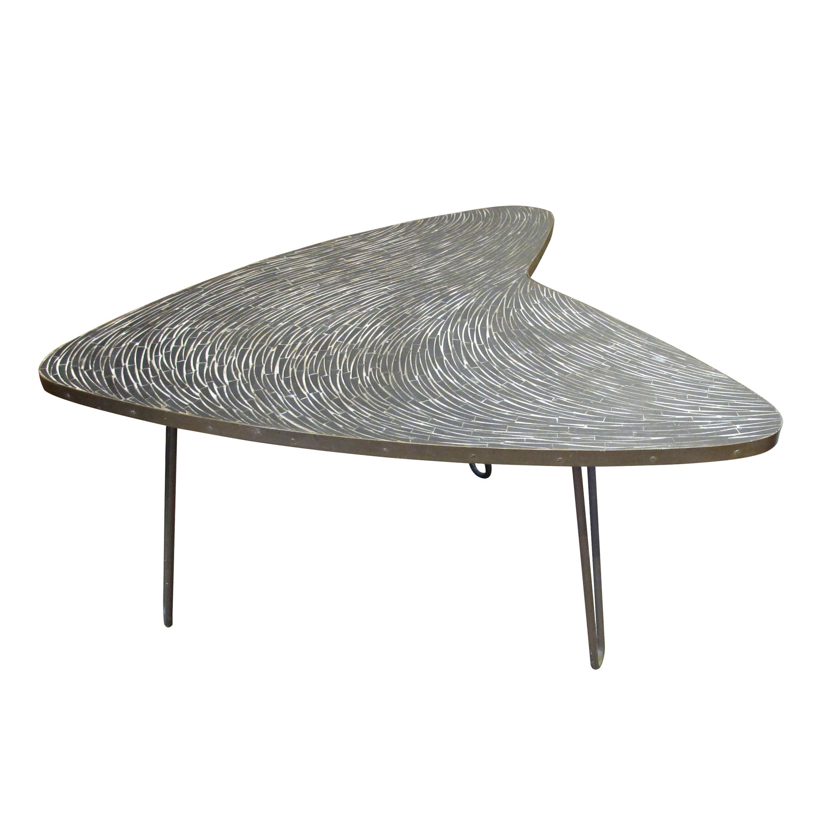 The table was designed by Berthold Müller, a German furniture designer who was known for his innovative and stylish work. Müller was inspired by the mid-century modern movement, and his designs are characterized by their clean lines, geometric