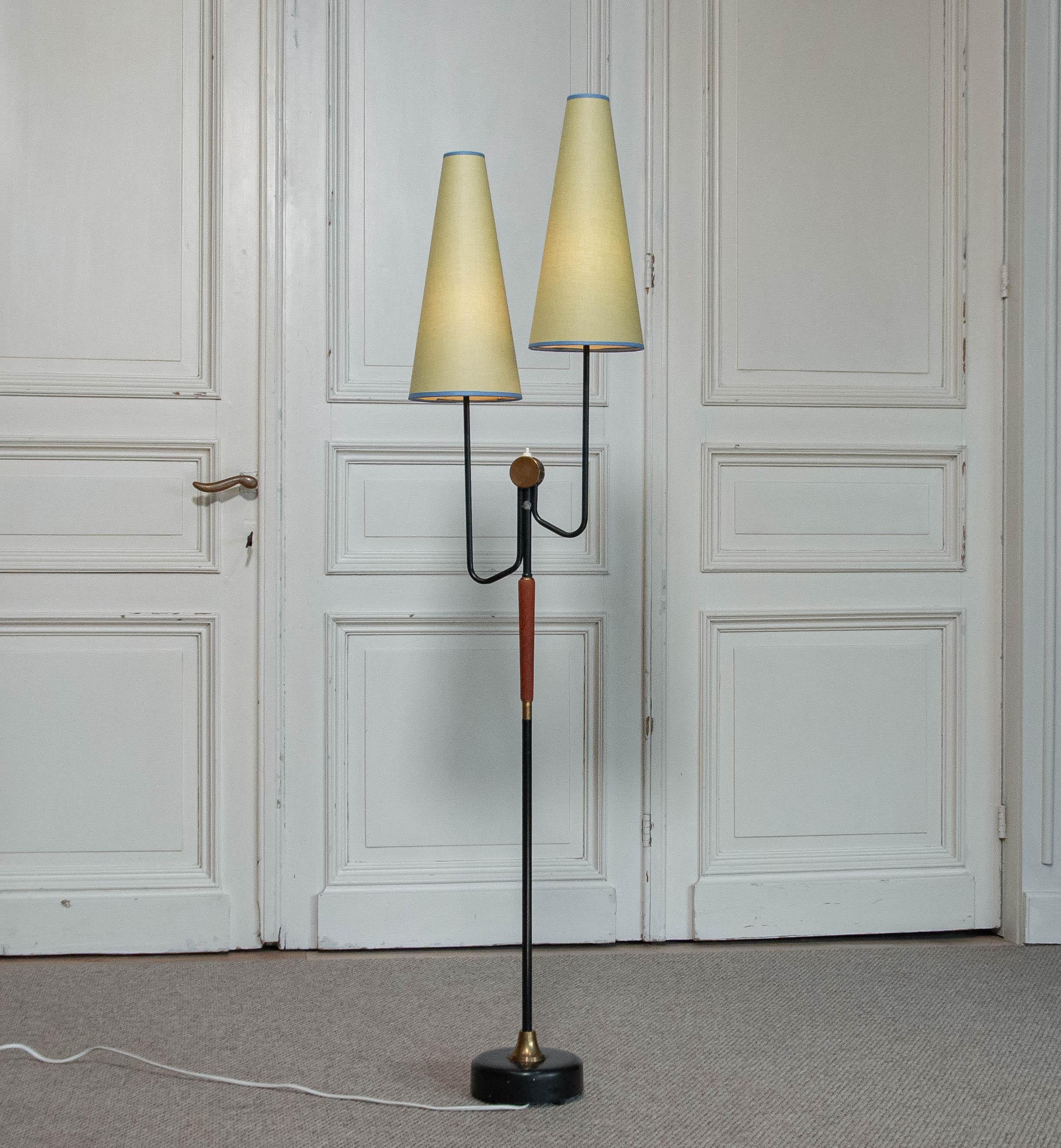 Beautiful floor lamp from 1950s made by Möllers Armaturfabrik , Sweden.
The shades are from a later period.
The lamp has new wiring and E14 screw fittings , the stand is made of black lacquered metal combined with teak.
In total the height of the